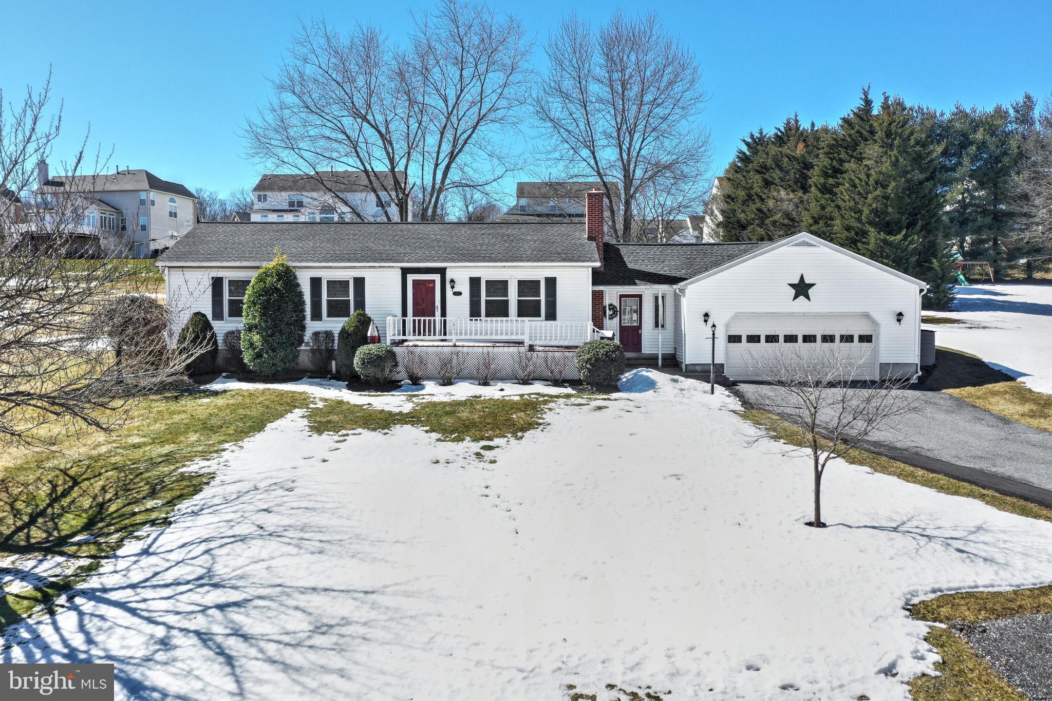 Don't miss this delightful 3-4BR 2BA rancher on a huge 1.36 acre lot right across from the New Freedom Rail Trail! Wonderfully maintained  & ready for its new owners with new roof in 2020, fresh paint & neutral decor throughout, cozy 4-season room off the kitchen and dining area separated by pocket doors . Full, newly carpeted  basement with large family room, full bath & possible 4th bedroom great for teens, guests or extended family!   You'll love the attached garage, breezeway and  patio overlooking the beautiful yard just starting to reveal the new growth of spring.  Outdoor patio includes a pergola with sun shade.  Convenient location with nearby parks, dining, shops & activities just a short walk from your front door offer all the pleasures of small town living. Come check it out before it's gone! One year home warranty! Original owners!