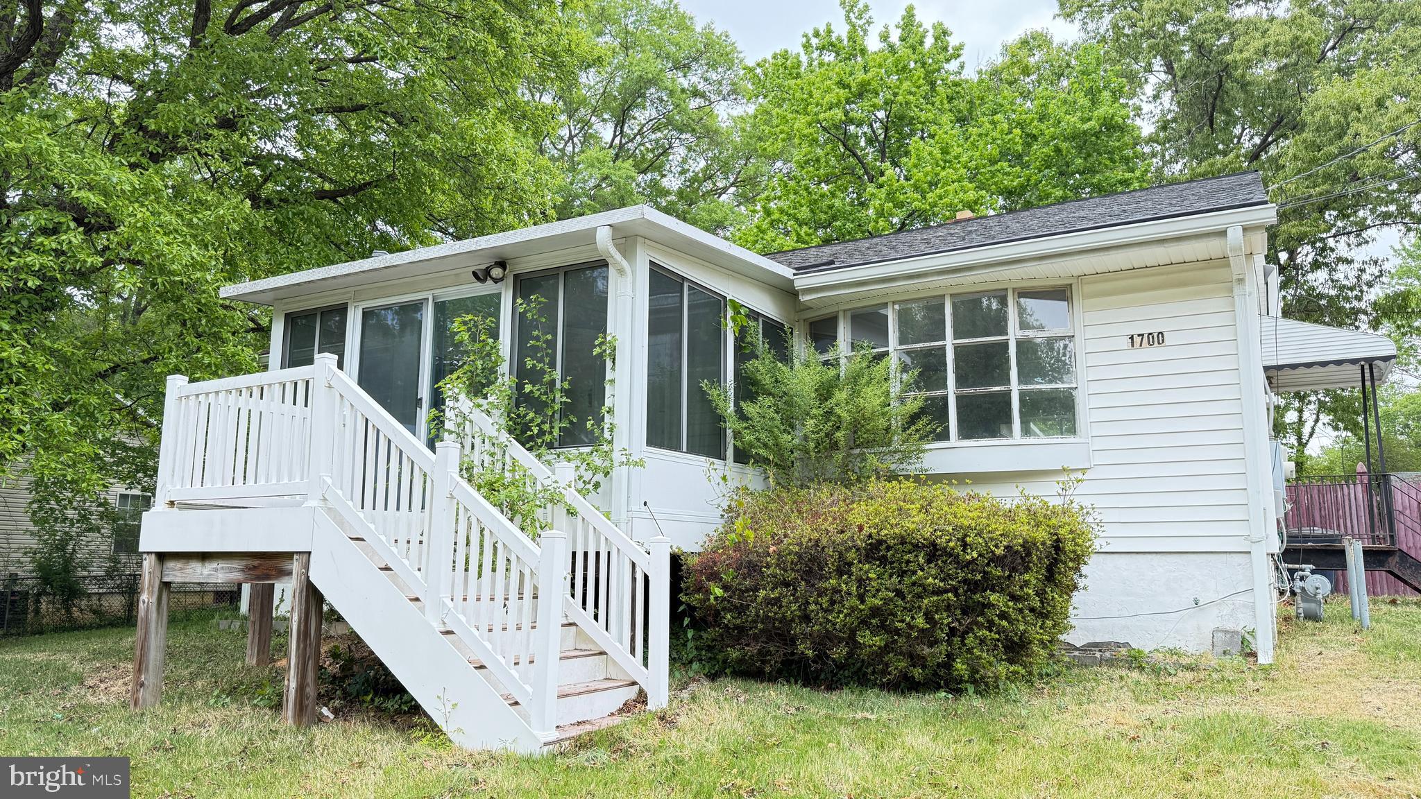 This spacious rambler has a lot going for it. Good layout, solid square footage, and a price that reflects where things stand today. The main level has a generous living room that flows into a three-season sunroom up front, three bedrooms, and two full baths. The primary suite has its own private bath, and there's a dedicated handicap-accessible ramp off the driveway with a separate entrance directly into that suite, a genuinely useful feature for buyers with accessibility needs.  The finished lower level adds real square footage with a full bath, so you've got options down there, rec room, home office, guest space, whatever fits your life. Out back the yard is mostly fenced with a gazebo and two storage sheds.  Photos can only tell you so much. The actual condition of this home is something you'll need to see in person, and that's worth doing. The layout, the size, and the location make a strong case for taking a look before someone else does.  Fort Washington puts you minutes from National Harbor, MGM, and Tanger Outlets, with easy access to MD-210 and the Capital Beltway. Downtown D.C., Joint Base Andrews, the Navy Yard, and the National Landing employment corridor are all a reasonable commute from here.  Priced to reflect current condition. Schedule your showing today.