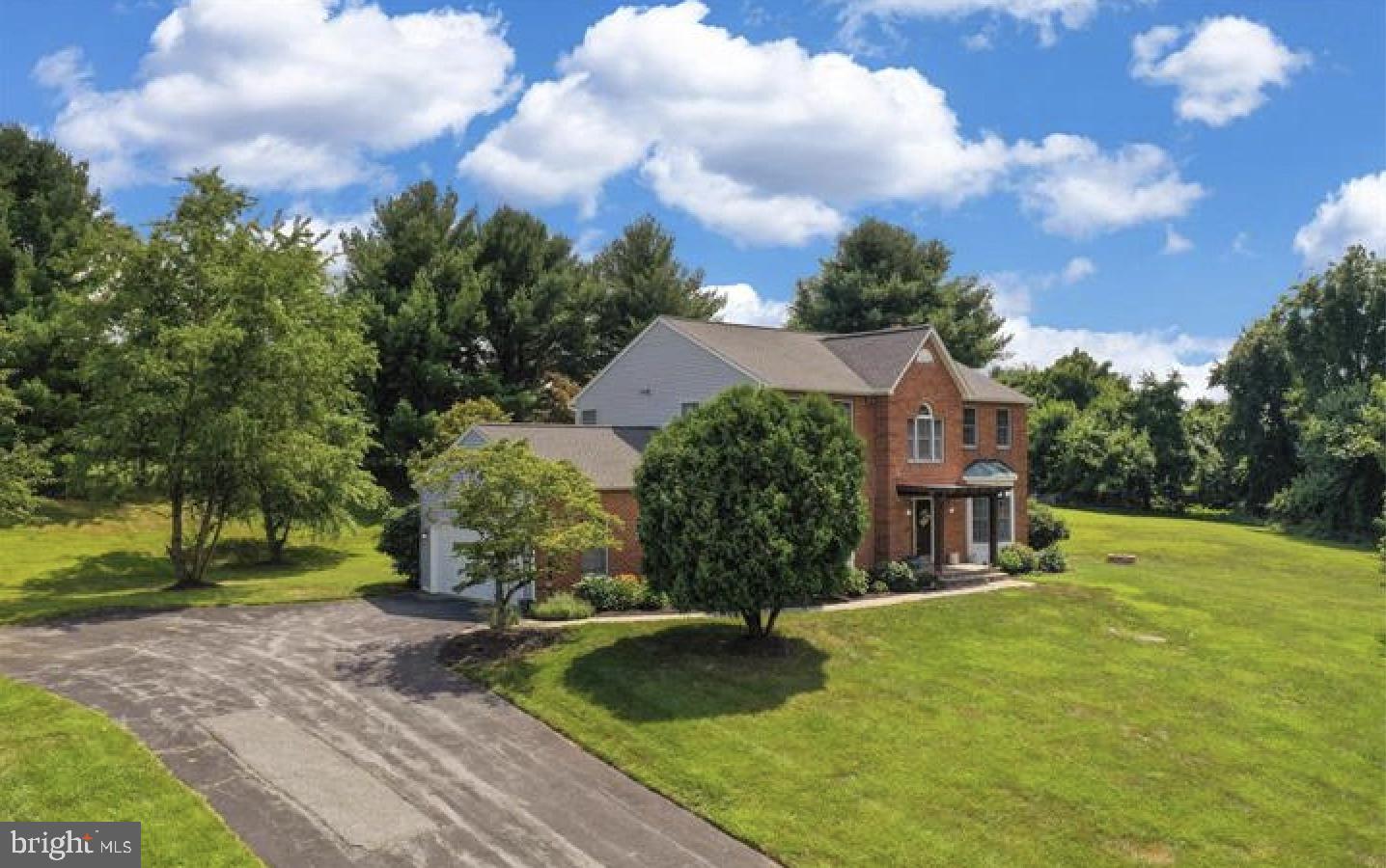 Nestled in the serene enclave of Mardella Run, this exquisite Colonial-style residence offers a harmonious blend of luxury and comfort, perfect for those seeking an elevated lifestyle. Spanning an impressive 3,600 square feet, this home is designed to cater to both relaxation and entertainment, making it an ideal sanctuary for modern living. As you step inside, you are greeted by an inviting open floor plan that seamlessly connects the family room to the gourmet kitchen. The heart of the home features a spacious island, perfect for casual dining or culinary creations, complemented by a pantry for all your storage needs. The family room, adorned with a cozy fireplace, invites warmth and intimacy, while the formal dining room sets the stage for elegant gatherings. The main level also boasts a luxurious primary suite, complete with a walk-in closet and a spa-like bathroom featuring a walk-in shower. Skylights and recessed lighting throughout the home create a bright and airy atmosphere, enhancing the overall sense of space and tranquility. Venture to the fully finished basement, where endless possibilities await. This versatile area can serve as a recreation room, home office, or additional living space, complete with a rear entrance for convenience. Outside, the property is set on a generous 1.35-acre lot, providing ample space for outdoor activities and relaxation. Enjoy the fresh air on the screened deck, perfect for morning coffee or evening gatherings under the stars. The meticulously maintained exterior, featuring a classic brick façade, adds to the home's timeless appeal. Additional high-end features include a side-entry attached garage with space for two vehicles, ensuring both convenience and security. The home is equipped with modern appliances, including a dishwasher, refrigerator, and washer/dryer, making daily living effortless. Located in a tranquil suburban setting, this property offers the perfect balance of privacy and accessibility. Enjoy the peace of a spacious lot while being just a short drive from local amenities, shopping, and dining options. This home is not just a residence; it's a lifestyle choice that embodies comfort, elegance, and the joy of living well. Experience the charm and sophistication of Mardella Run, where every detail has been thoughtfully curated for your enjoyment.