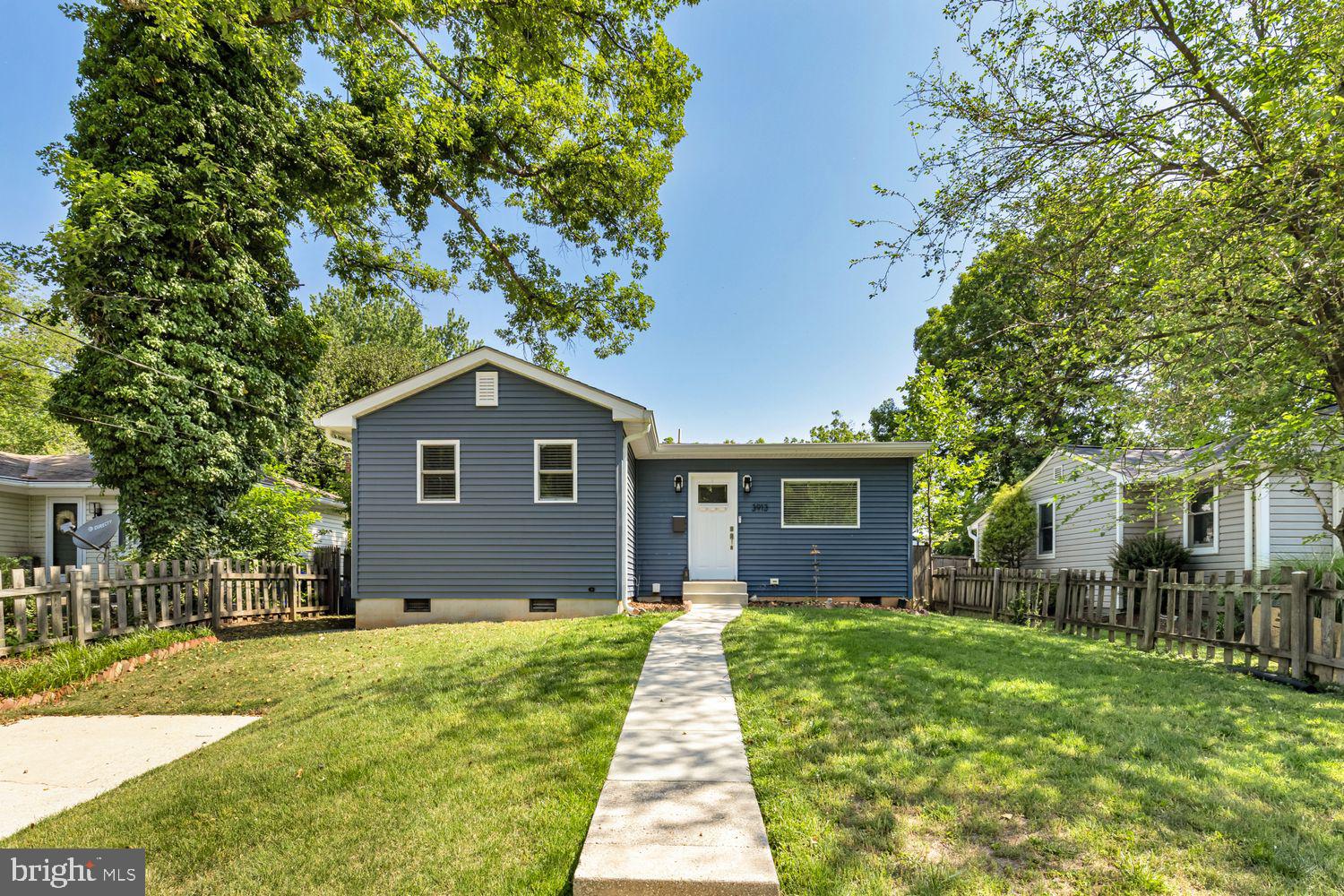 THIS IS IT - the BEST all updated 2-bedroom, 2-bath bungalow with the most beautiful open kitchen designed for easy entertaining and everyday living - steps from Rock Creek Park and all things Kensington. Enjoy gleaming hardwood floors that run throughout the home, complemented by thermopane windows.. Situated on a spacious lot, the exterior offers exceptional outdoor living with a newly built rear deck, level fenced yard, driveway, and an oversized workshop/shed with electricity—perfect for hobbies, storage, or creative space. Enjoy easy access to neighborhood favorites including Knowles Station Wine & Co., La Gelattaria and Old Two Market. Minutes from the charming Frankly pizza and BabyCat brewery, plus nearby shopping, coffee shops, parks, and everyday conveniences that make Kensington living so appealing. LOCATION is SUPERB and this home offers immediate value, a great condo alternative. Photos have been virtually staged.
