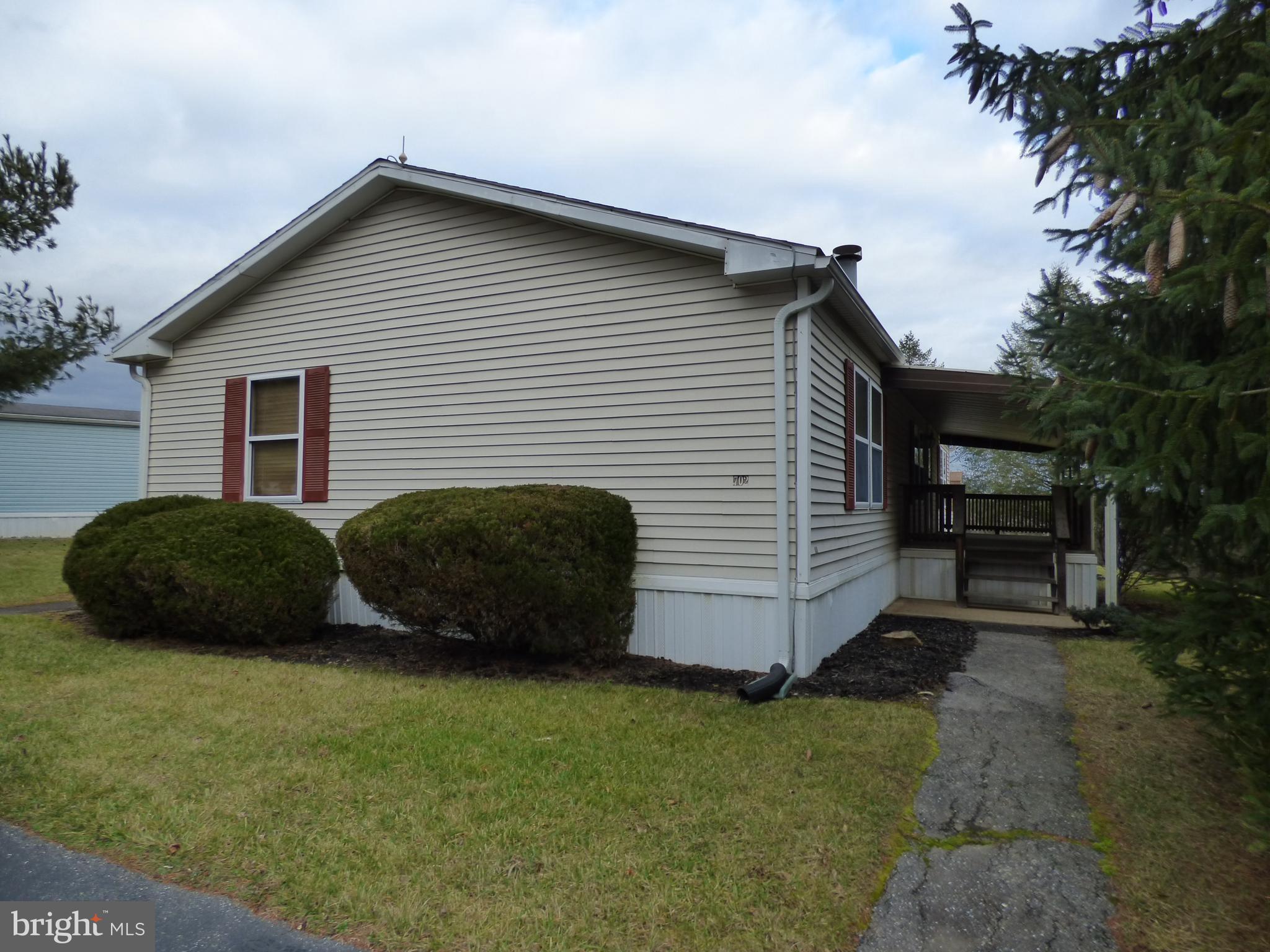 Don’t miss out on this great 1990 1,431 sq ft mobile home with front & rear decks, a shed, a master bedroom with a master bath, 3 bedrooms 2 full baths & a fireplace in the living room.  This mobile home has 3 bedrooms with newer raised panel sliding doors, newer raised panel bedroom doors, some updating in the kitchen, a deep double bowl kitchen sink with a newer chrome faucet, all appliances, a newer water heater, neutral carpeting & neutral vinyl floors, decks with steps to grade, multiple skylights, off street parking & vaulted ceilings.  Hurry before this great opportunity passes you by!  This is a cash, 'as is' sale.