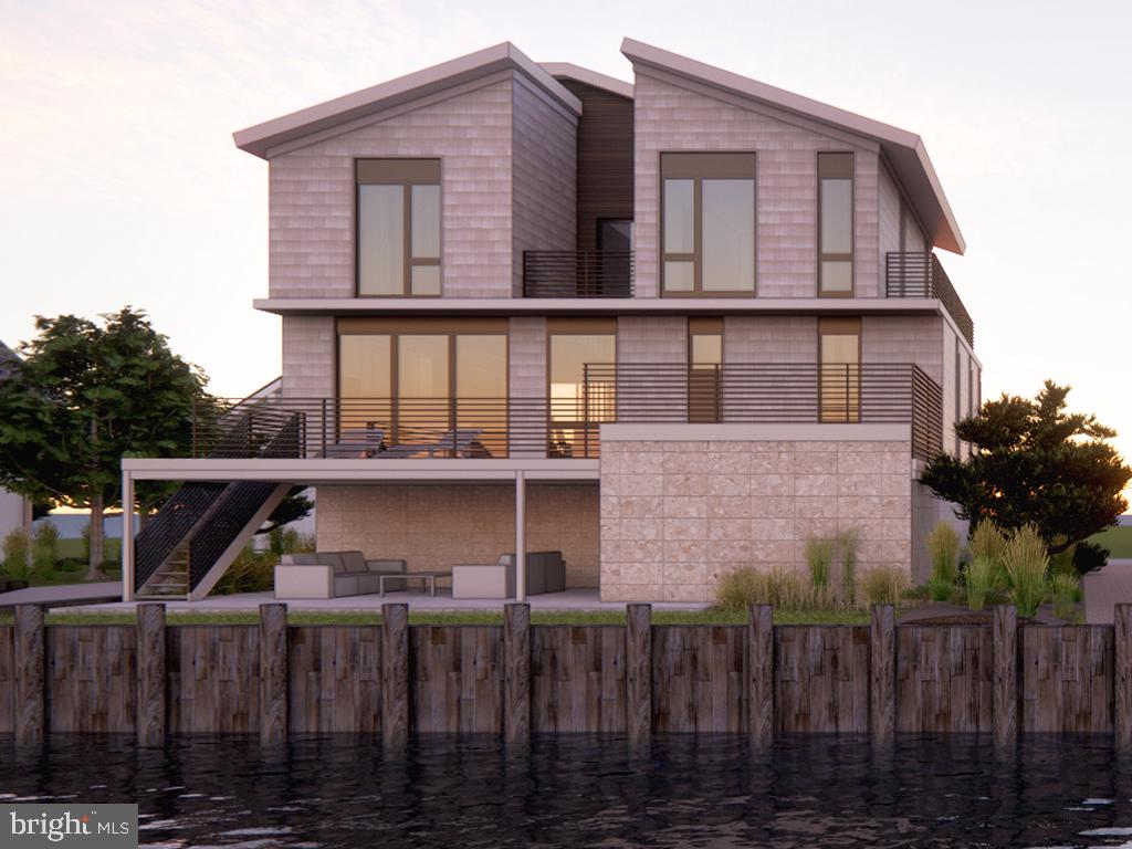 Built by Grit Coastal. Your dream beach house is here! This brand new 5-bedroom, 5-bath canal front home in South Bethany is built for making memories.  Oversized lot with around 3,100 square feet of bright, open living space, there’s room for the whole crew to spread out and enjoy. What makes it extra special? You get canal views from both the front and back, plus access to a shared boat ramp—perfect for paddleboarding, kayaking, or hopping on the boat for a sunset cruise. After a day at the beach or out on the water, come home to your private heated 8x16 pool, then head up to the rooftop deck for evening cocktails and canal breezes. Inside, it’s all about easy coastal living—spacious bedrooms with private baths, an elevator for convenience, and plenty of room to gather, relax, and unwind. Whether you're looking for a vacation getaway or a rental-friendly investment, this South Bethany beauty checks all the boxes!