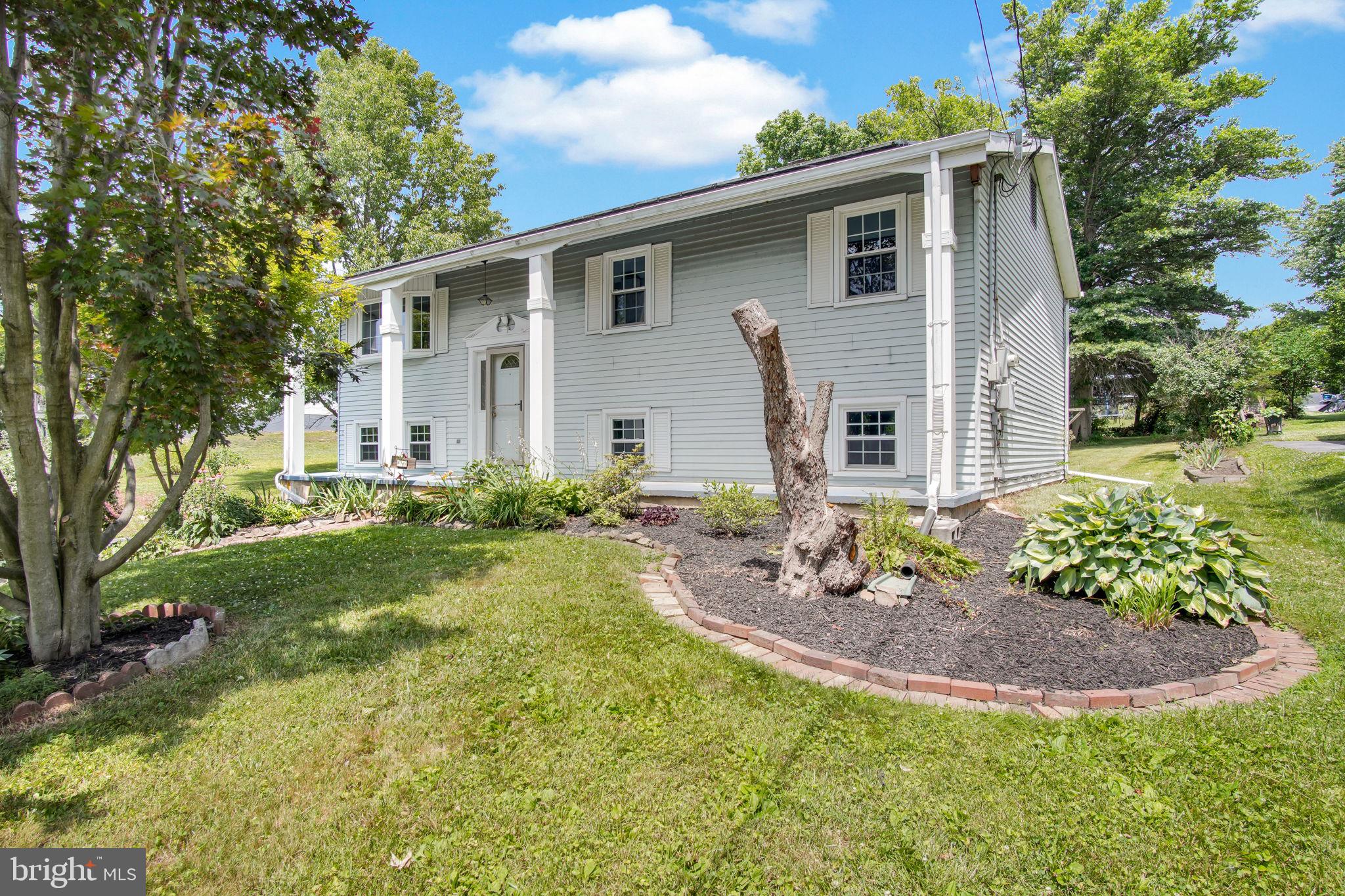 Beautiful double lot in Lake Meade, often referred to as South Central PA’s best kept secret!  Come check out this affordable home with quality features.  Owned by the same family for over 30 years and painstakingly cared for and maintained impeccably.  The roof and seller owned solar panels were replaced in 2024.  Attention to the smallest need was addressed immediately over the years from new plumbing, HVAC system with UV light for air quality control, whole house salt free water conditioner, replacement windows, on-demand/tankless hot water heater, exterior doors and much much more (see Attachment to SPD).  The upper level has been freshly painted and new flooring installed too!  There are 3 bedrooms on this level and 1 bedroom on the lower level of this split foyer.  Need that 5th bedroom?  Look no further – the bonus room is just waiting for you.  Use it as a family room, bedroom or office.  The large utility/laundry room has a half bath that could easily be updated and offers extra storage as well.  The integral garage will gladly accommodate your motorcycle, lawn equipment, outdoor furniture, and lake toys.  Need more room?  Looking for a she shed or man cave?  There is a detached two level 2 bay workshop just waiting for you!  Your annual dues include the use of a 320 acre lake that is less than 3/10ths of a mile from your front door! Imagine yourself relaxing on your pontoon boat and enjoying the beautiful sunsets over the lake after a hard days work or simply relaxing in the quiet on your spacious back deck!  LAKE MEADE is a man made lake with over 5 miles of shoreline. A private community with 24/7 gatehouse attendees that offers fishing, boating, water skiing, tubing, paddle boarding, kayaking, wake boarding and swimming. The entire lake is a no wake zone until 10am, so fishermen and kayakers can traverse the lake in peace. The community swimming pool offers a 12 foot deep end with a giant slide, lap lanes and a zero entry section complete with mushroom fountain for the munchkins. The marina has two boat launches for easy access plus a small restaurant. There are playground areas, volleyball courts, a half basketball court, tennis/pickleball courts and much more. Come see all Lake Meade has to offer. PLEASE NOTE: Lake Meade is a gated community and a licensed realtor is required to gain access for showings.