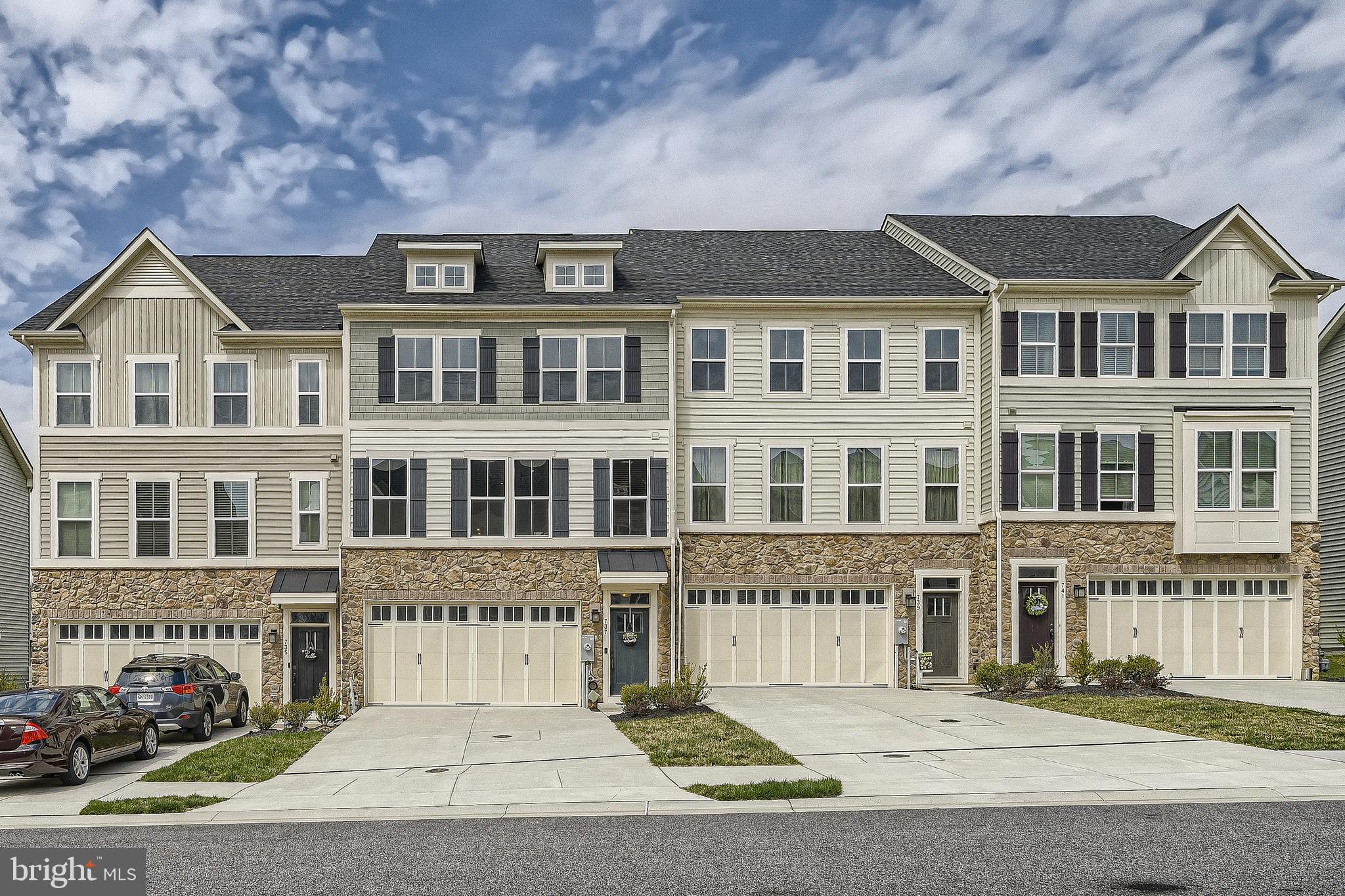 Welcome to 737 Iron Gate Rd, a beautifully maintained townhome in the sought-after Magness Mill community, offering nearly 2,500 square feet of well-designed living space. The open-concept main level features hardwood flooring and a spacious layout perfect for both everyday living and entertaining. The upgraded kitchen serves as the heart of the home, complete with granite countertops, stainless steel appliances, a large center island, and a convenient butler’s pantry. A main-level powder room adds functionality for guests.

Upstairs, you’ll find generously sized bedrooms, including a spacious primary suite with an upgraded walk-in shower. The upper-level laundry provides added convenience, while a versatile bonus area offers the perfect space for a home office, study, or flex use.

The fully finished lower level expands your living space with a large open area, full bathroom, and an additional bedroom or multi-purpose room—ideal for guests, recreation, or extended living.

Additional features include a two-car garage, attractive stone and vinyl front exterior, and a unique split staircase design. Ideally located just steps from the community pavilion, this home offers a perfect blend of comfort, space, and convenience.

Schedule your showing today and see all that this home has to offer.