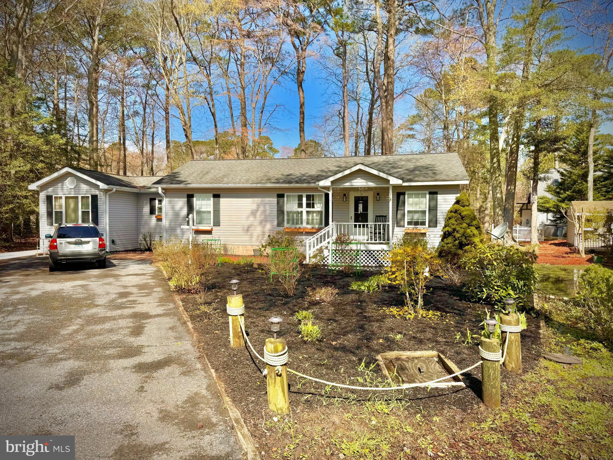 Welcome to this charming 3-bedroom, 2-bathroom home located in the highly desirable Ocean Pines community. This spacious home offers a comfortable living space, ideal for family life or relaxation. Ocean Pines provides an array of amenities including scenic walking/jogging paths, a recreation center, playgrounds, a golf course, and 3 refreshing swimming pools for your enjoyment. The community is home to local favorites such as Southgate Grille and the Yacht Club, where you can enjoy delicious meals and drinks. A short drive takes you to Berlin, known as the Coolest Town in America, and less than 10 miles to the stunning Ocean City beaches and boardwalk. Sold unfurnished, this home is ready for you to make it your own and enjoy all the benefits of living in this vibrant, coastal community.
