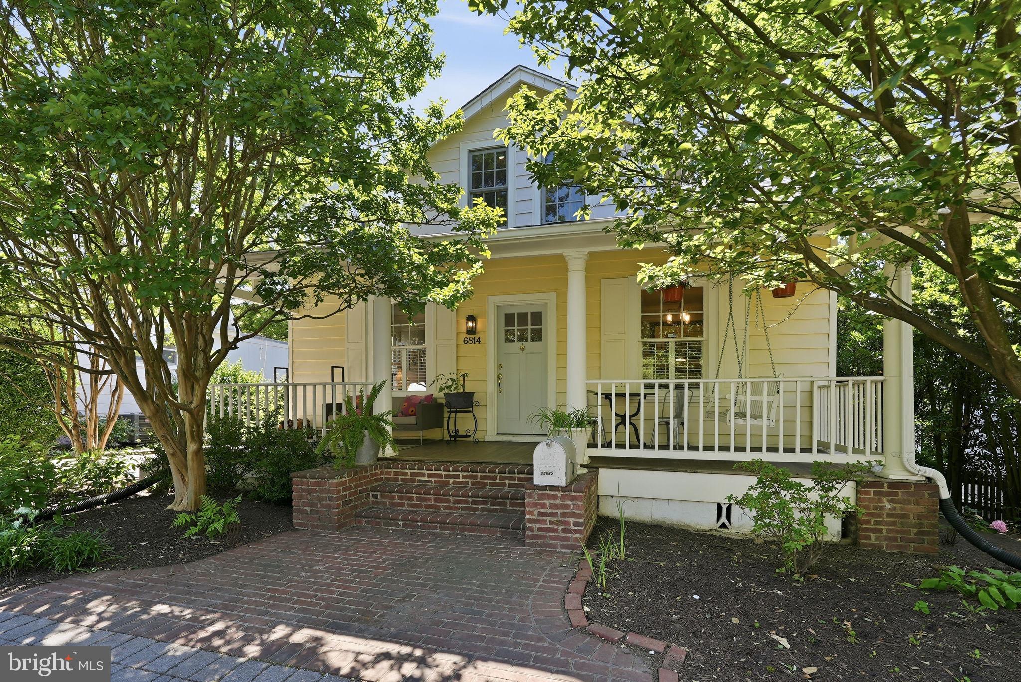 Nestled in Chevy Chase, this charming and thoughtfully designed bungalow offers 3 bedrooms, 2 full baths, 1 half bath, two-car garage, and a circular driveway with parking for at least two additional vehicles. Filled with natural light, custom built-ins, and abundant storage, the home blends timeless architectural character with everyday comfort.

The main level features 9-foot ceilings, dentil crown molding, a wood-burning fireplace, and graceful archways connecting the living room, dining room, and den. A first-floor bedroom with an adjoining bonus room provides flexibility for a home office, playroom, guest suite, or additional living space.

Upstairs, a window seat framed by built-in bookcases creates a welcoming landing. The spacious primary suite includes extensive built-ins, a large window seat, a walk-in closet, and a well-appointed bath with a soaking tub and glass-enclosed shower. A third bedroom and two generous attic storage areas complete the upper level.

Additional highlights include separate HVAC systems serving each floor and recently replaced kitchen and laundry appliances. The unfinished basement offers natural light and convenient rear egress, with many possibilities—whether as a home gym, living space, or generous storage area.

Outside, mature landscaping and a circular driveway create a sense of privacy and arrival. The side and rear yards offer ample space for outdoor entertaining, play, gardening, or possible future expansion.

Just steps from Brookville Market and La Ferme, this location offers easy access to some of the neighborhood's most beloved destinations. Enjoy nearby green spaces including Gazebo Park, Chevy Chase Local Park, and Rock Creek Park. Wisconsin Avenue's shops, restaurants, and everyday conveniences are just over a mile away, with easy access to the Red Line Metro.

Rich in character, this one is a special opportunity in Chevy Chase Section 3.