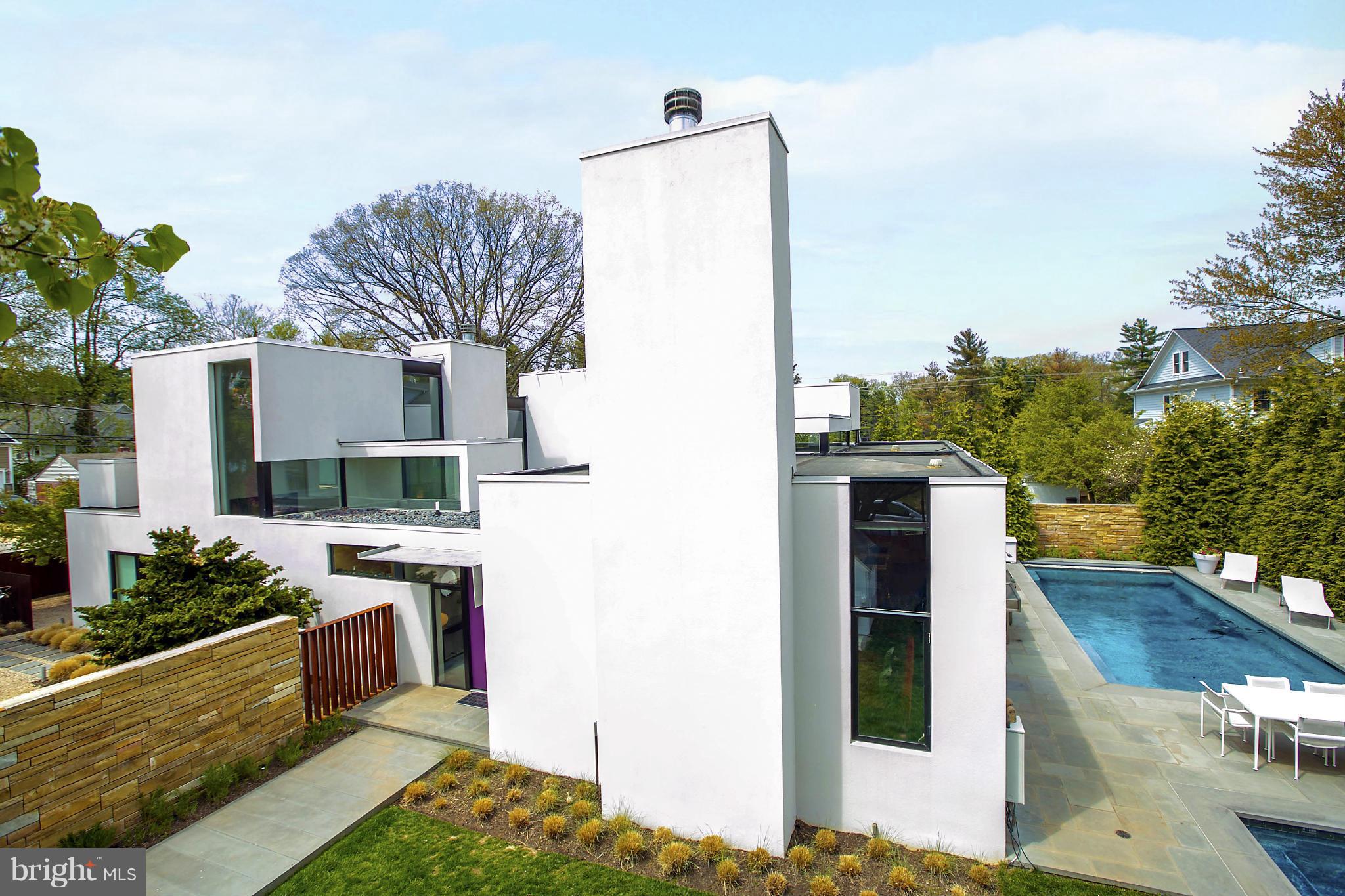 STUNNING, AWARD-WINNING CONTEMPORARY DESIGNED BY INTERNATIONALLY ACCLAIMED ARCHITECT, DAVID JAMESON (FORMERLY HIS PERSONAL RESIDENCE), FEATURES CALIFORNIA-STYLE INDOOR/OUTDOOR LIVING. INTERIOR COURTYARD AND LARGE WINDOWS PROVIDE LIGHT THROUGHOUT. HIGH CEILINGS, DRAMATIC SPACES, FIRST FL MASTER SUITE, OPEN LIVING AREA.PRIVATE LOT W/ POOL & SPA.  MINUTES TO DOWNTOWN BETHESDA.