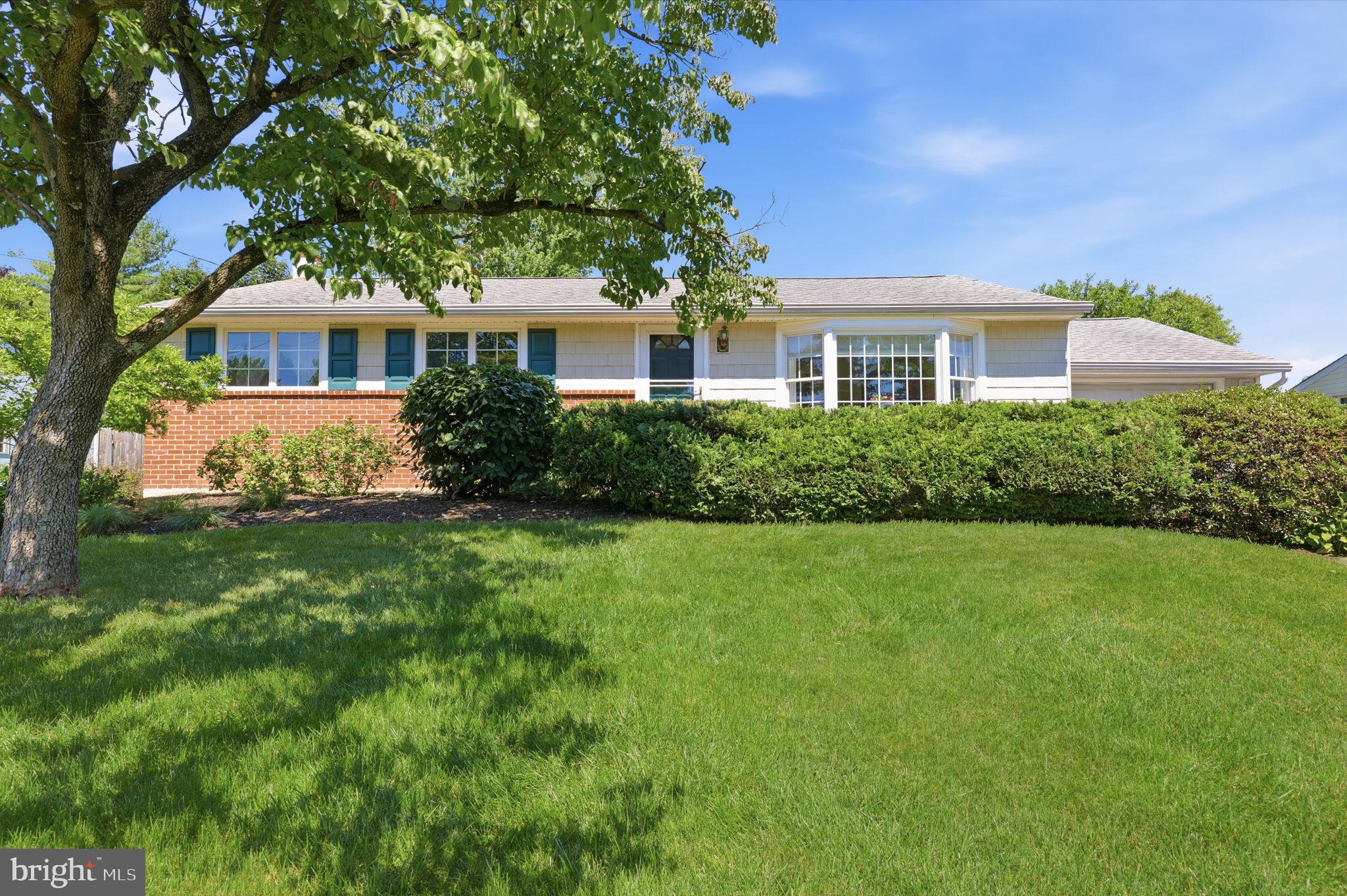 This charming rancher, lovingly maintained by its original owner, boasts 3 bedrooms, 1 full bath and 2 half baths, including one in the primary bedroom.  You will love the bright sunroom with the cozy gas stove that invites year-round enjoyment. The finished basement features laundry, additional storage and a half bath. Outside enjoy the natural landscaping, the bluestone patio for entertaining, all on a peaceful quiet street. A 1-year home warranty is included for your peace of mind.  Great location close to shopping, restaurants and Kemper Park, this home is ready for your finishing touches to make it truly your own!