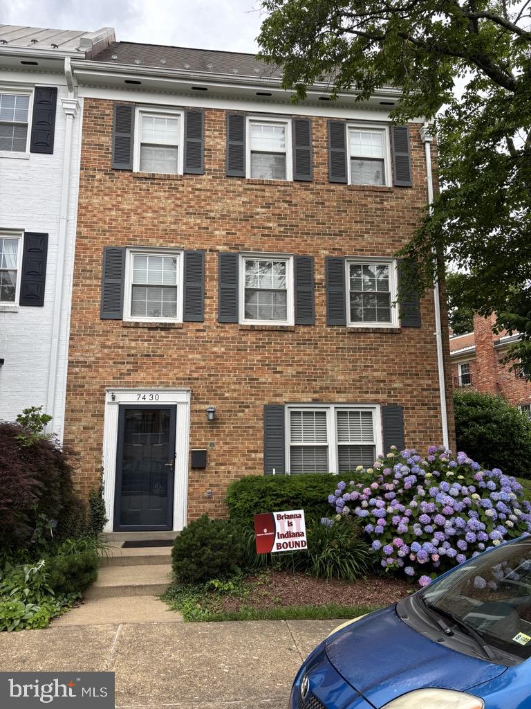 Welcome to this beautifully updated end-unit townhome, where comfort meets convenience! Enjoy an open-concept layout filled with natural light, featuring gleaming hardwood floors, an upgraded kitchen, and stylishly renovated bathrooms. The spacious bedrooms offer room to relax, while two cozy fireplaces add warmth and charm. Step outside to your private, fully fenced patio—perfect for outdoor dining or quiet mornings. Designated parking space included. Ideally located less than a mile from McLean Station and just minutes from shopping, dining, and more.