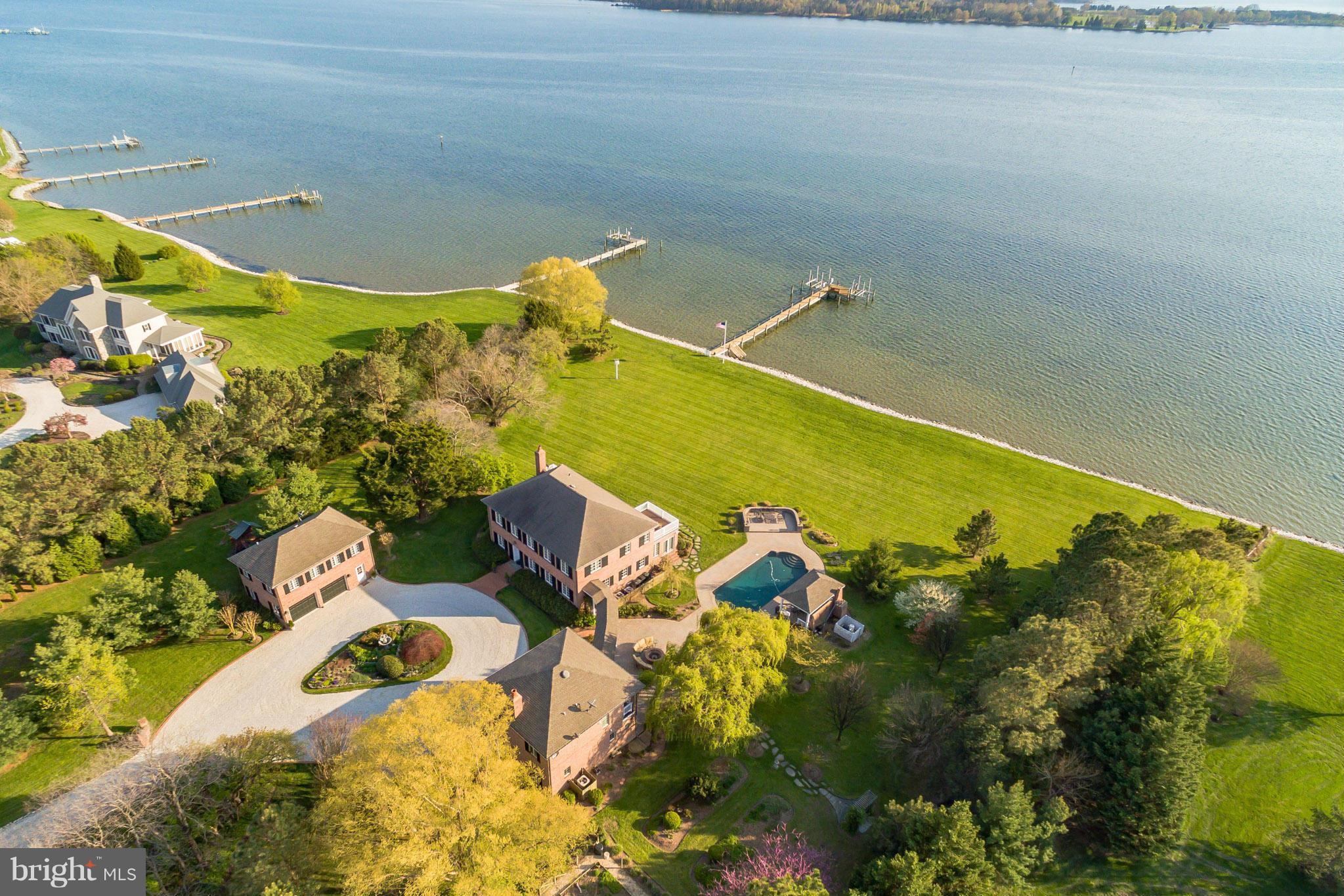 Paradise found, treasured waterfront estate custom built to combine European style & elegance. 359' private waterfront..extraordinary sunset views. The prestigious Seven Swans Estate, 5643-sq.ft., 6-bedroom, 4.4BA Main house/guest house, plus 1BD 1/2BA Guest qtrs over 3 car detached garage on almost 4 acres situated along the banks of San Domingo Creek*PRIVATE DRIVE*BY APPT*Visit the Virtual Tour
