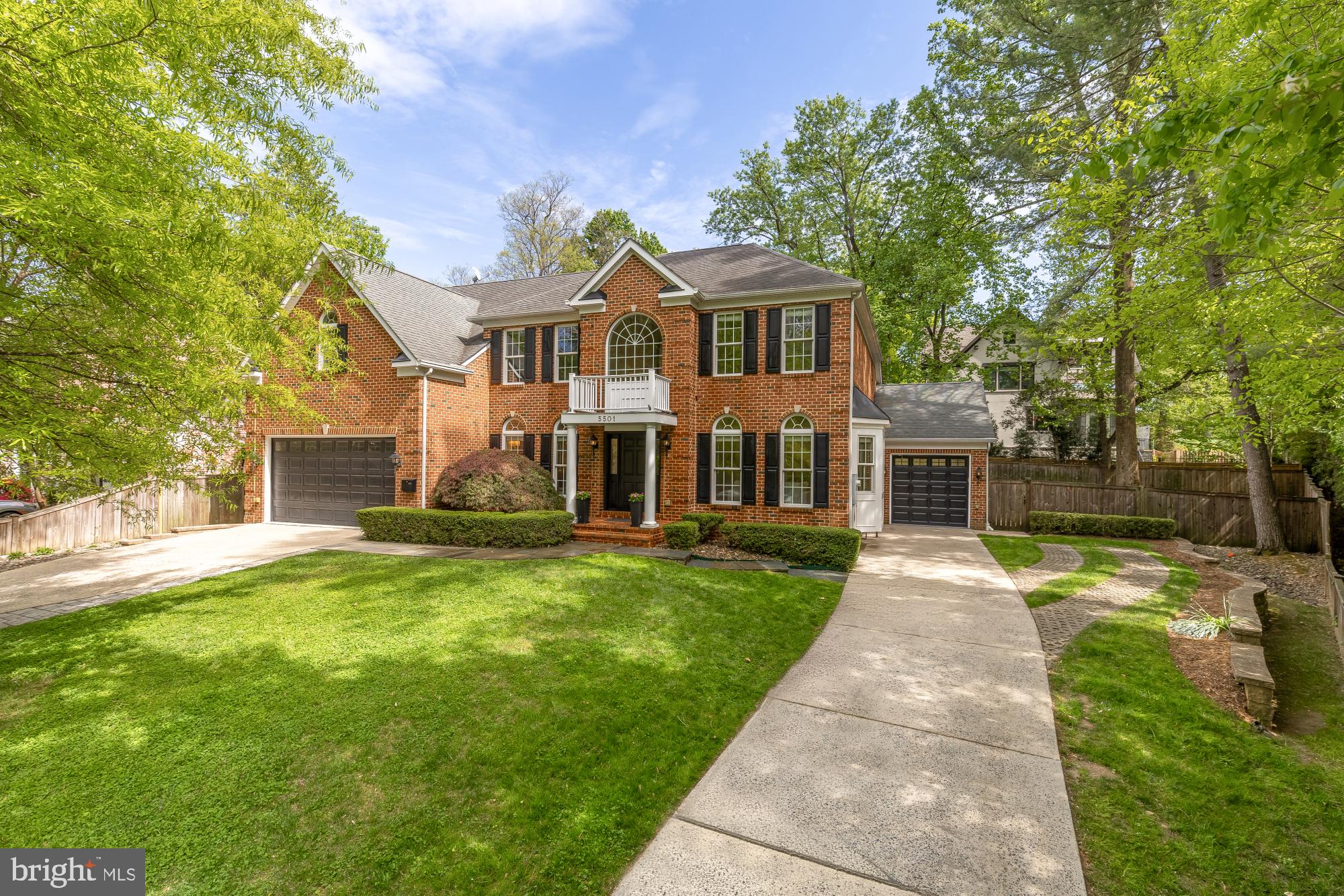 Welcome to 5501 Montgomery Street — a striking 6-bedroom, 5.5-bathroom residence nestled in the heart of the coveted Village of Chevy Chase. Offering over 6,200 finished square feet, this modern and meticulously updated home delivers the ideal blend of luxury, comfort, and an unbeatable location.

Step through the front door into a grand two-story foyer, where a stunning chandelier and elegant center staircase make a memorable first impression. A formal living room and dining room flank the entry, introducing the hardwood floors, refined moldings, and architectural details that carry throughout. The first floor is thoughtfully designed for both entertaining and everyday living, with multiple gathering spaces — including a spacious family room and versatile playroom — flowing seamlessly into a gourmet kitchen, sun-drenched breakfast room, and extra-large home office. Completed in 2026, the brand-new kitchen is a chef's dream, featuring Sub-Zero appliances, a Wolf range, expansive stone countertops, and custom cabinetry reflecting premium craftsmanship throughout. The newly renovated mudroom offers a dedicated drop zone from the attached two-car garage, custom storage, a utility sink, and a new washer and dryer. A main-level powder room rounds out the first floor.

Upstairs, five generously sized bedrooms await, anchored by a luxurious primary suite with tray ceilings, a spa-inspired ensuite bath with an oversized soaking tub, dual vanities, two spacious walk-in closets, and three additional closets. Two of the remaining four bedrooms enjoy their own ensuite baths, and all bedrooms feature custom closet organizers. The finished lower level expands the living space with two recreation areas — one outfitted as a dedicated home theater with a projector and the other warmed by a handsome stone fireplace — as well as a private gym, a sixth bedroom with direct egress to the backyard, and a newly finished full bathroom.

Beyond the stunning new kitchen and mudroom, this home has been meticulously maintained and upgraded with new HVAC systems, a whole-house generator, new hot water heaters, a whole-house water filtration system, and Nest smart smoke detectors, among other upgrades.

The outdoor spaces are equally captivating. A bluestone hardscaped patio is ideal for al fresco grilling and dinner parties, while the private, fully fenced yard offers lush landscaping, ample room to play, and a generous green side yard for additional recreation. Parking and storage are exceptional: in addition to the attached two-car garage, a separate one-car garage is equipped with an EV charger for modern convenience. A large unfinished basement room, accessible from the backyard, offers flexible space for storage, a creative studio, or a workshop.

Living in Chevy Chase Village means access to exceptional community services, including home security checks, key management, package handling, engaging community programming, and convenient twice-weekly back-of-the house trash and recycling pickup. No more dragging cans to the front of the house!  The neighborhood is charming, tree-lined, and wonderfully walkable — just steps from the Friendship Heights Metro, acclaimed dining at Sushi-Ko and Capital Grille, boutique shopping, and Whole Foods. The home is also mere blocks from Chevy Chase DC's parks, library, and neighborhood favorites like Opal and Little Beast. For commuters, the location is unmatched — with the Friendship Heights Metro just steps away and three total garage spaces (including an EV-equipped bay), this home is perfectly positioned for any commuting situation, whether by rail, road, or electric vehicle. Easy access to bus lines, the Capital Beltway, and Ronald Reagan Washington National Airport rounds out the exceptional connectivity.

This move-in-ready residence combines luxurious updates with thoughtful design in one of the Washington metropolitan area's most desirable