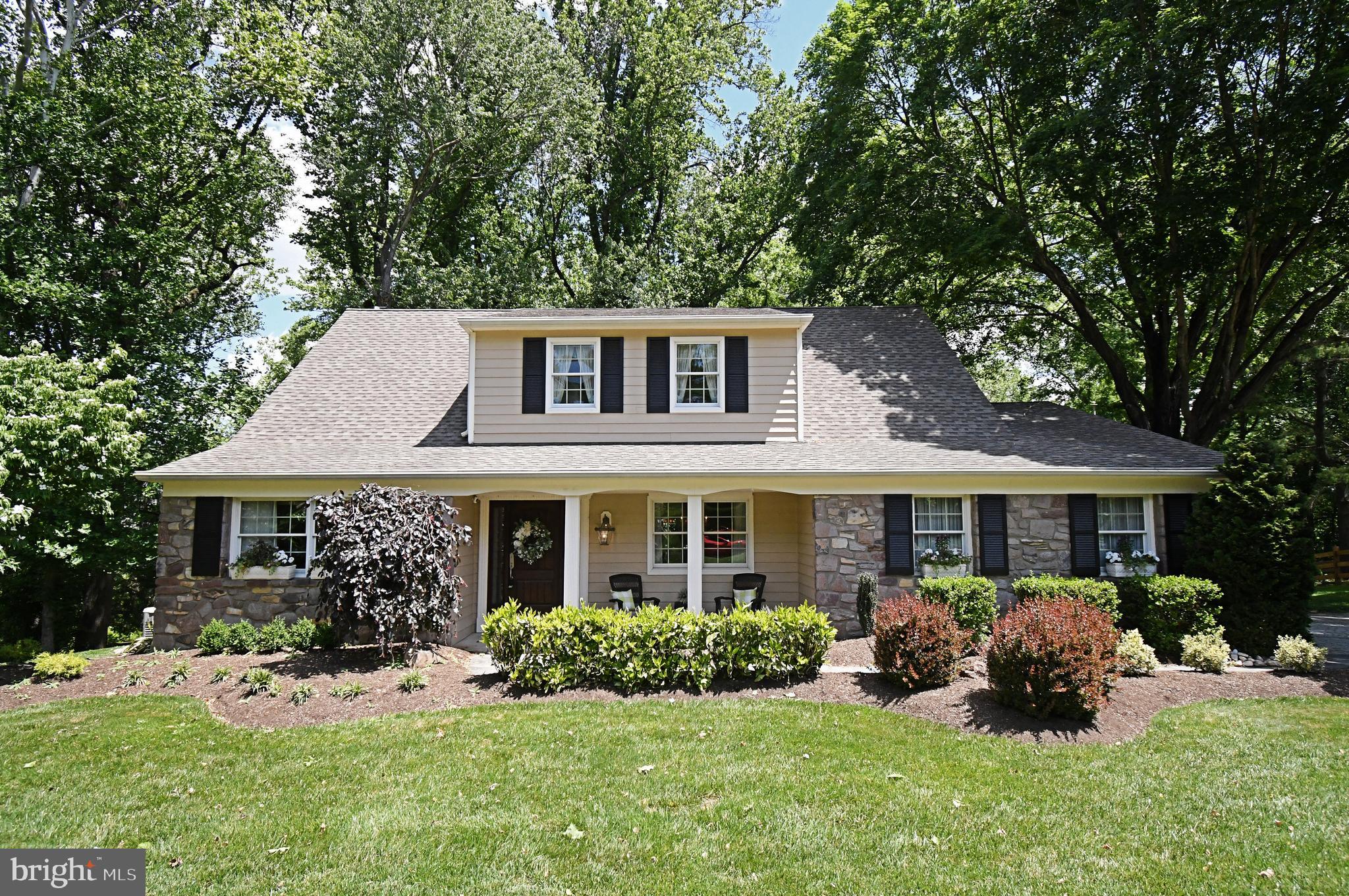 Welcome to this exceptional 4-bedroom, 2.5-bath home nestled in the heart of Yardley Boro, where timeless craftsmanship, thoughtful upgrades, and quality construction shine throughout. From the moment you arrive, the beautifully landscaped grounds, paver driveway, and secluded yard with a tranquil pond create a private retreat-like setting. At the heart of the home is the beautifully appointed kitchen featuring granite countertops, a center island, classic subway tile backsplash, and premium KitchenAid appliances. Inside, the home is filled with character and elegant detail, showcasing extensive custom trim work, solid wood doors, crown molding, recessed lighting, and wainscoting throughout the stairwell. Rich solid wood flooring flows throughout the home, complemented by classic parquet flooring and a warm gas fireplace that anchors the inviting living space. The spacious hall bathroom offers both a full shower and a Jacuzzi tub, creating a spa-like retreat for everyday comfort. Thoughtfully maintained throughout, the home also features Andersen windows, a new boiler, and a whole-house generator for added peace of mind. The full walk-out basement provides endless possibilities for additional living space, storage, a home gym, or recreation area. Step outside to enjoy the expansive Trex deck overlooking the serene backyard and pond. A rare opportunity to own a beautifully appointed home in one of Bucks County’s most desirable locations, offering the perfect blend of charm, craftsmanship, and modern convenience.  One Year Weichert Home Protection Plan included.  All furniture in the home is negotiable.