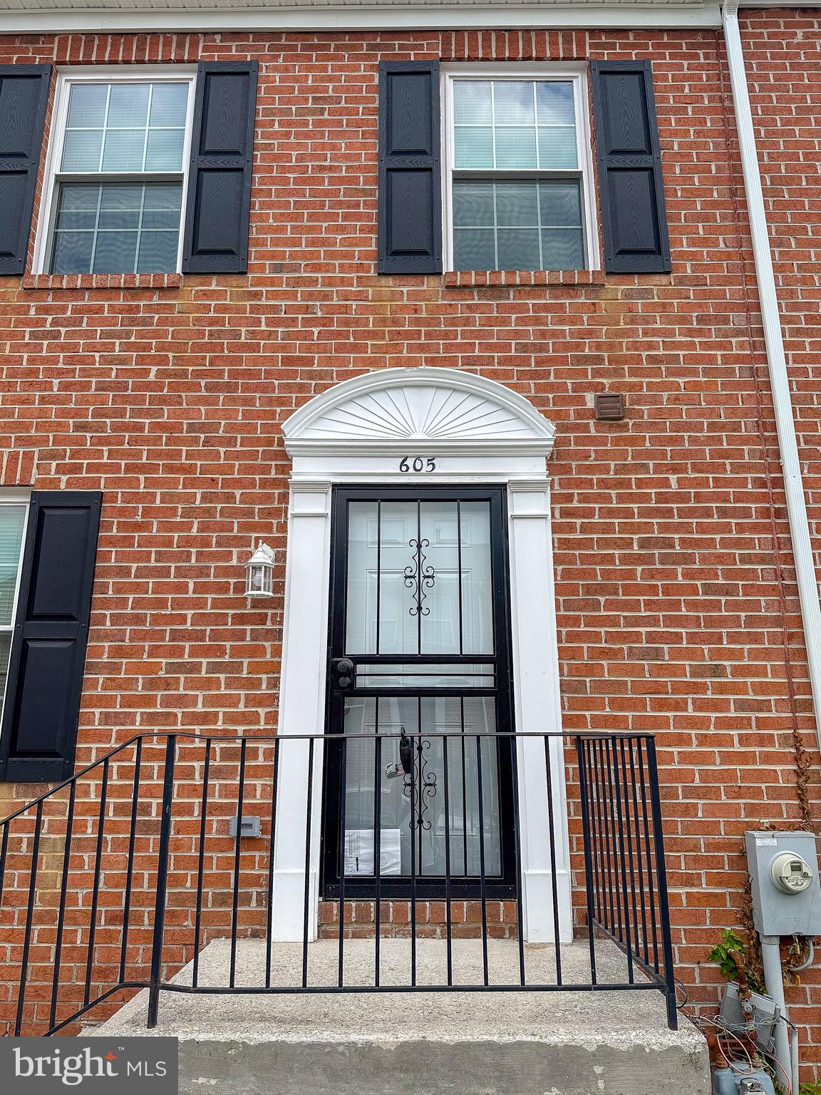 Terrific brick-front 3-bedroom, 2.5-bath town-home located on a quiet street in a convenient location. Fully renovated from top to bottom, featuring a new roof, HVAC system, windows, deck, appliances, and an updated kitchen. This home offers a separate dining room, spacious primary suite with private bath and large closet, plus a finished recreation room with recessed lighting. Enjoy a private fenced backyard with a deck, perfect for relaxing or entertaining. Move-in ready and close to downtown, the harbor, shopping, dining, and major conveniences.