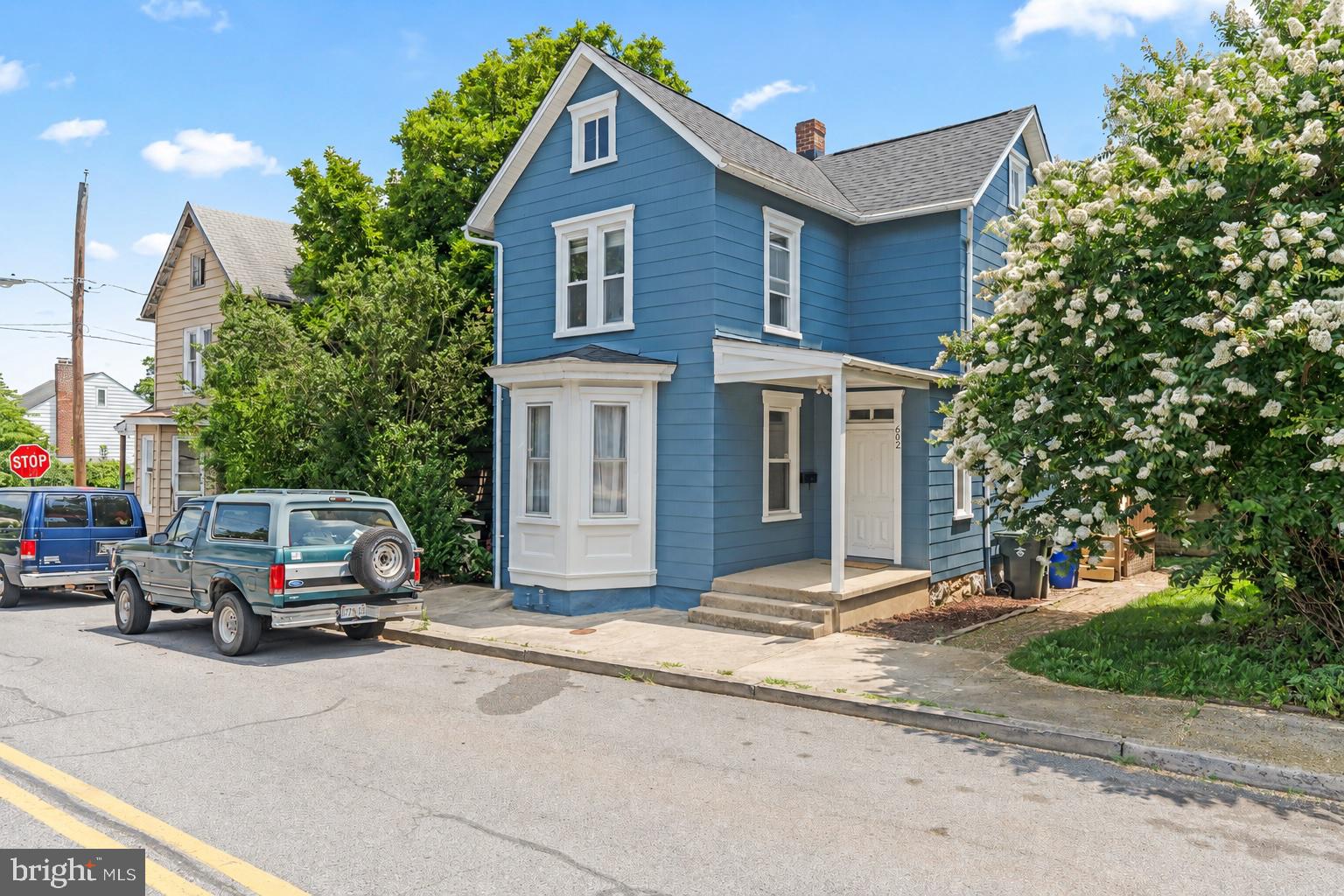 Adorable Victorian home near city park!  Come see the newly remodeled kitchen with new appliances, cabinets, butcher block counters,  and huge pantry. The back of the house addition offers main level laundry hook ups, a powder room ,  and access to a newly updated deck .  off street parking is available via the back alley with a 2 car garage behind the property. 
The 2nd level offers 2 large bedrooms and a 3rd bonus room that could function as an office or a closet. The bathroom has been recently updated with new flooring. Wood floors throughout the house, a new roof , and several other recent updates make this a great starter home .