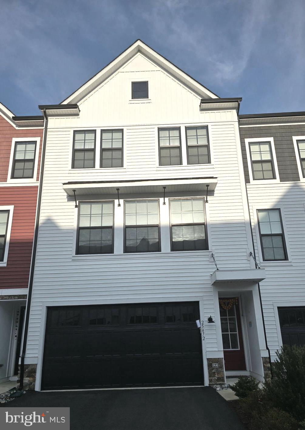 Welcome to 25472 Nichols Orchard Terrace, a stunning 4-bedroom, 3.5-bath luxury townhome in the highly sought-after Prosperity Plains community! This nearly new (built in 2021) home offers 2,820 sq. ft. of modern living space with high-end finishes and an open floor plan.

✨ Key Features:
✔️ Gourmet Kitchen – Quartz countertops, stainless steel appliances, large island & ample cabinet space
✔️ Spacious Living Areas – Sunlit open-concept design with hardwood floors
✔️ Primary Suite – Walk-in closet & spa-like en-suite bath
✔️ Fully Finished Lower Level – Perfect for a rec room, home office, or guest suite
✔️ Breathtaking Views & Privacy – Enjoy stunning views and ultimate privacy from all floors
✔️ Expansive Patio & Deck – Large outdoor spaces ideal for relaxing and entertaining
✔️ 2-Car Garage – Plus additional driveway parking
✔️ Washer & Dryer Included – Conveniently located on the upper bedroom level

🏡 HOA Amenities Include:
✔️ Trash & snow removal
✔️ Lawn care
✔️ Saltwater pool
✔️ Clubhouse with a fitness center
✔️ Multiple playgrounds

Located in the prestigious Prosperity Plains community, this home offers easy access to major commuter routes (Route 50, Loudoun County Pkwy, & Dulles Airport) and is walking distance to shops, dining, parks, and top-rated schools.

Don’t miss this move-in-ready opportunity—schedule your showing today! 🚪🏡