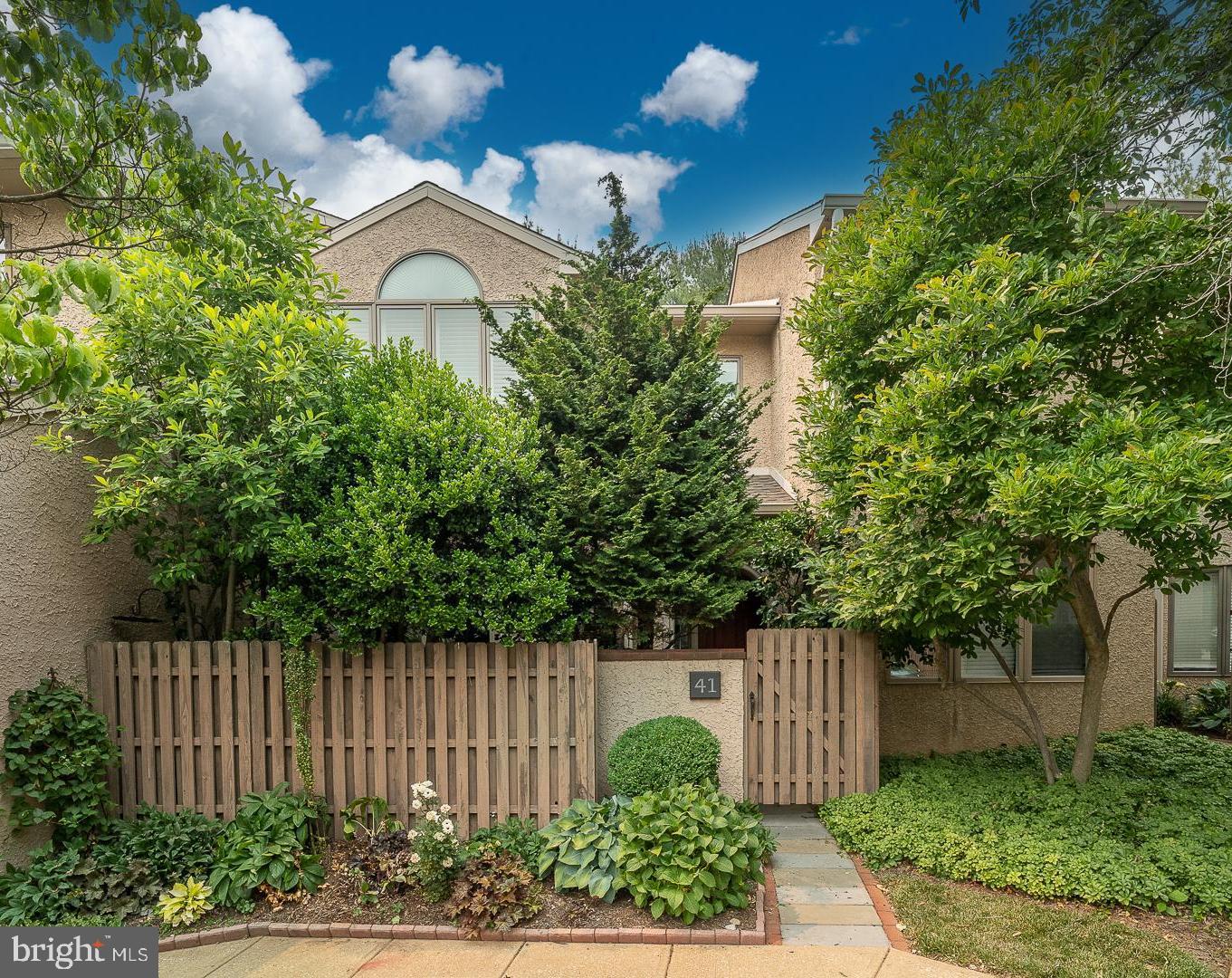 Easy living in sought after Greythorne Woods community in an ideal location, walkable to Wayne and the Radnor Trail (private entrance from the community). This 3 story, 2 Bed/2.5 bath townhome with coveted 1 car detached Garage is not only spacious but offers full privacy in one of the two fenced-in patios for relaxing on crisp fall days! From the Foyer, enter into the updated and character-filled eat-in Kitchen with an abundance of cabinets, quartz countertop, stainless steel appliances, pantry and slider to the fenced front patio. As you move into the Formal Dining Room that opens to the Living Room with fireplace and outside access to the back patio, you will notice the soaring vaulted ceiling with skylight that spans all 3 stories. A Powder Room and hardwood floors complete this level. On the 2nd Floor, the Primary Bedroom with ceiling fan features a wall of windows and window bench with added storage, large walk in closet and separate linen closet. Sun streams through the sky-lit Primary Bathroom that has vaulted ceiling, jetted tub, vanity and frameless glass shower. Moving down the hall you’ll find laundry closet and a nice size Office with shelving and an opening that overlooks the Living Room. As an added bonus, there’s an additional space that could be used as a small 2nd office or large walk-in closet. The 3rd floor sky lit Bedroom with recessed lighting has En-suite Bath with skylight, shower and pedestal sink. This could be the perfect place to call home. Additionally, you'll enjoy the benefits of being part of the award-winning Radnor School District and being just minutes away from shops, restaurants, and the train station.