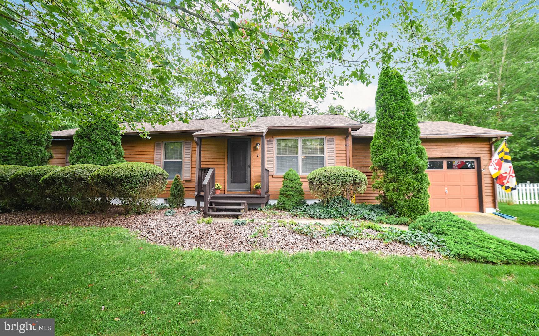 This charmer is ready for its new owner!  The pride of ownership has been maintained throughout this three bedroom home.  Many improvements have been made to include: 2019  exterior house stained, foundation painted, granite counter tops installed in kitchen; 2018  new roof, paved driveway, new shed; 2014  new appliances (stainless), new flooring (laminate wood grain look in dining room, living room and hallway; laminate tile look in kitchen and bath); 2012-2014  new HVAC (outside unit), new hot water heater. There is an OVERSIZED 1 car garage that can accommodate cars, toys, work and/or storage space!!  Outside enjoy the deck, firepit and privacy of the treed backyard and there you will find the generously-sized shed for additional storage.  Location is key with this house.  Minutes from NAS Pax River 3rd gate and a short drive to restaurants and shopping.
