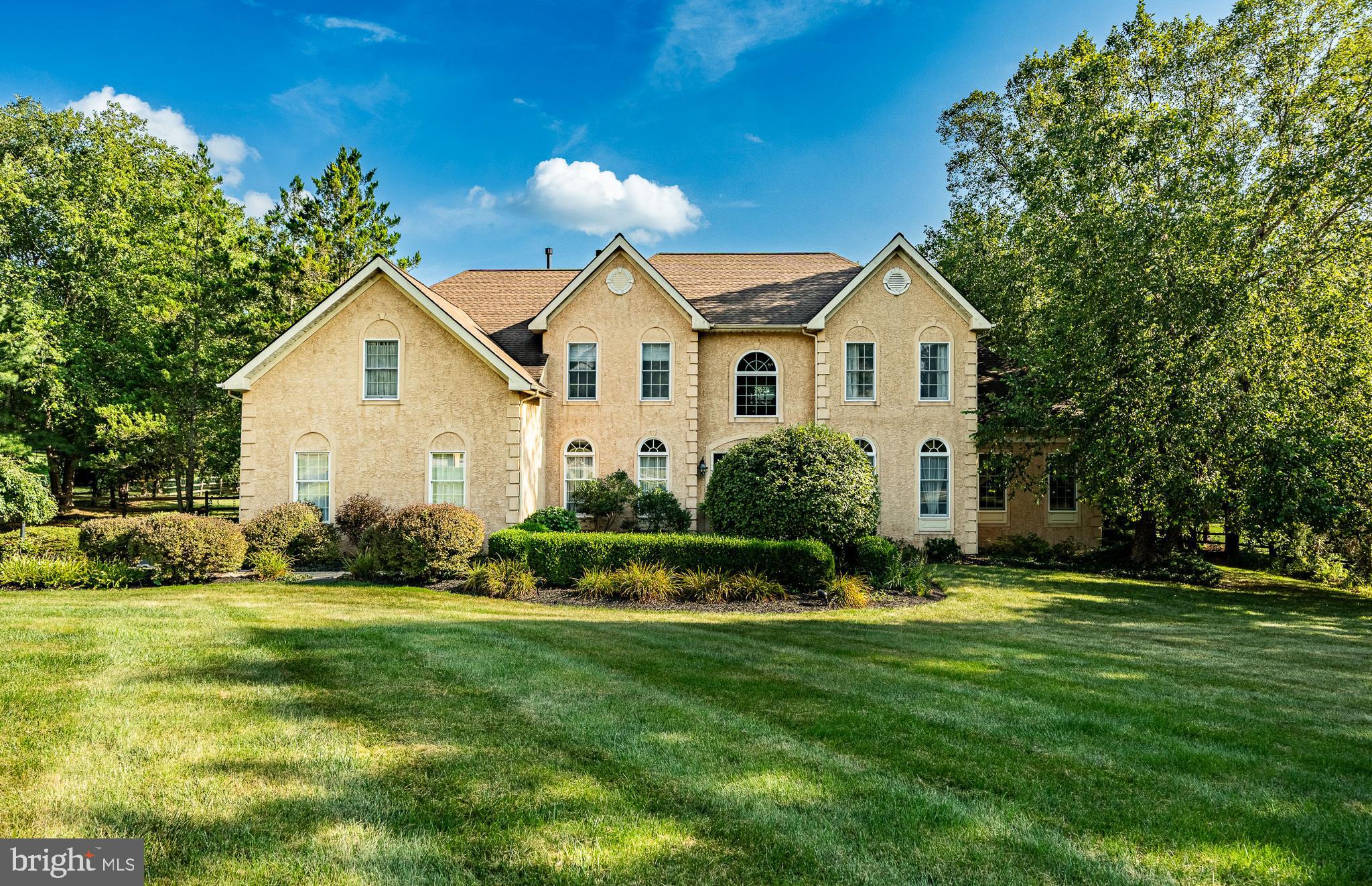 Welcome to 19 Founders Way, a gorgeous and meticulously maintained 4-bedroom, 3.5-bathroom single-family home nestled on a picturesque 1.4-acre lot in the award-winning Downingtown School District. Thoughtfully updated and beautifully cared for, this exceptional home offers the perfect blend of elegance, comfort, and privacy. Step inside the impressive two-story foyer, which sets the tone for the refined living spaces throughout. To the left of the entryway, a formal living room is flooded with natural light and enhanced by classic crown molding and chair rail detailing. To the right, an additional formal room provides access to a private office with custom built-in bookcases, along with a versatile flex room—ideal for a home office, gym, playroom, or whatever your lifestyle may require. Continuing through the main level, the inviting family room serves as the heart of the home, featuring a stunning stone fireplace, vaulted ceiling, and skylights that fill the space with warmth and light. Just off the family room, the incredible eat-in kitchen (which was remodeled in 2016) is a chef’s dream, boasting gas cooking on a Viking 6 burner, top-of-the-line appliances, a large center island that is handmade with an African hardwood called Iroko that offers additional seating, and a beverage refrigerator—perfect for everyday living and entertaining alike. A convenient half bathroom and laundry room complete the main level. Upstairs, retreat to the luxurious primary suite, offering a spacious sitting area, a three-sided fireplace, tray ceiling, large walk-in closet, and a spa-like ensuite bathroom that was remodeled in 2022 and was designed for relaxation. Two additional bedrooms share a Jack-and-Jill bathroom, while the fourth bedroom enjoys its own private ensuite bath. The finished basement provides endless possibilities, featuring plush carpeting, built-in shelving, and abundant storage space—ideal for a media room, recreation area, home gym, or all of the above! Step outside to your own private backyard oasis. Entertaining is effortless on the expansive two-level flagstone patio, which leads to the stunning in-ground pool with attached jacuzzi—your personal retreat for summer days and evenings under the stars. Buy with peace of mind knowing the roof was replaced in 2019, along with all 4 skylights, and there is a whole-house generator. There is also a home warranty with Liberty Home Guard that is good through February 6, 2028! Situated on a quiet street, this home offers peaceful, private living while remaining conveniently close to Marsh Creek State Park, local shopping, dining, and major roadways. A truly special property that combines luxury, space, and an unbeatable location—this is one you won’t want to miss!