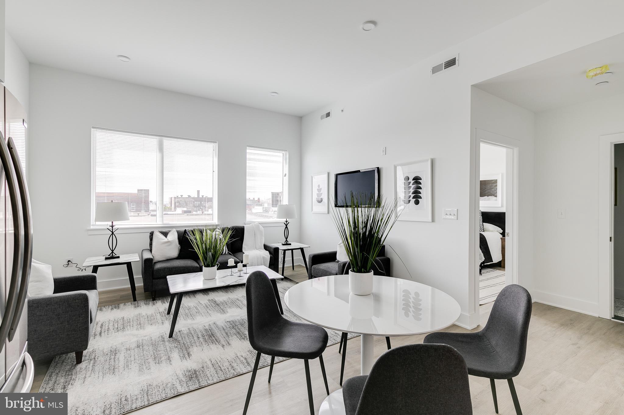 *Available 7/1!*

Don’t miss the chance to live in a beautiful 52-unit apartment building at 2201 Washington Avenue! Situated in the charming Graduate Hospital neighborhood, this building is near many local conveniences, restaurants, and attractions that are sure to make for an enjoyable living experience. The walkability is unparalleled as you can reach the Schuylkill River Park, larger shops like Target and Sprouts Farmers Market, plus mom and pop businesses like The Sidecar Bar & Grille and Loco Pez, all by foot! Public transit is also accessible via Washington Avenue and Broad Street, and you are close to I-76 for zipping in and out of the city.

This sunny 1 bedroom, 1 bathroom apartment comes with modern finishes, including hardwood floors, central AC, in-unit laundry, as well as recessed lighting. Natural light is also abundant with multiple windows. The kitchen is beautifully designed with white cabinetry, quartz countertops, stainless steel appliances and honeycomb backsplash tiling. The contemporary full bathroom features a shower/tub and sleek vanity with a unique lighted mirror. Finally, enjoy building amenities that include a shared roof deck with stunning city views as well as a convenient bike storage room.

Lease Terms: Generally, 1st month and 1-month security deposit are due at, or prior to, lease signing. Landlord may require other terms such as last month’s rent upfront—$ 65 application fee per applicant. Tenants are responsible for: electricity, gas (if applicable), cable/internet, and a $10/mo technology fee. Water is a flat monthly fee of $60. Additional fees or requirements may be applicable for units with Homeowners or Condo Associations. Landlord Requirements: Applicants to make 3x the monthly rent in verifiable gross income, credit history to be considered, have no evictions within the past 5 years, and must have a verifiable rental history with on-time rental payments. Exceptions to these criteria may exist under the law and will be considered. Cosigners will be considered.

*Pricing reflects the net effective rent after a 1-month credit is applied to a 12-month lease at $1,695/mo.
*1 dog OK (max 45 lbs), NO cats. $50/mo pet rent required.
*Photos of a similar unit.
