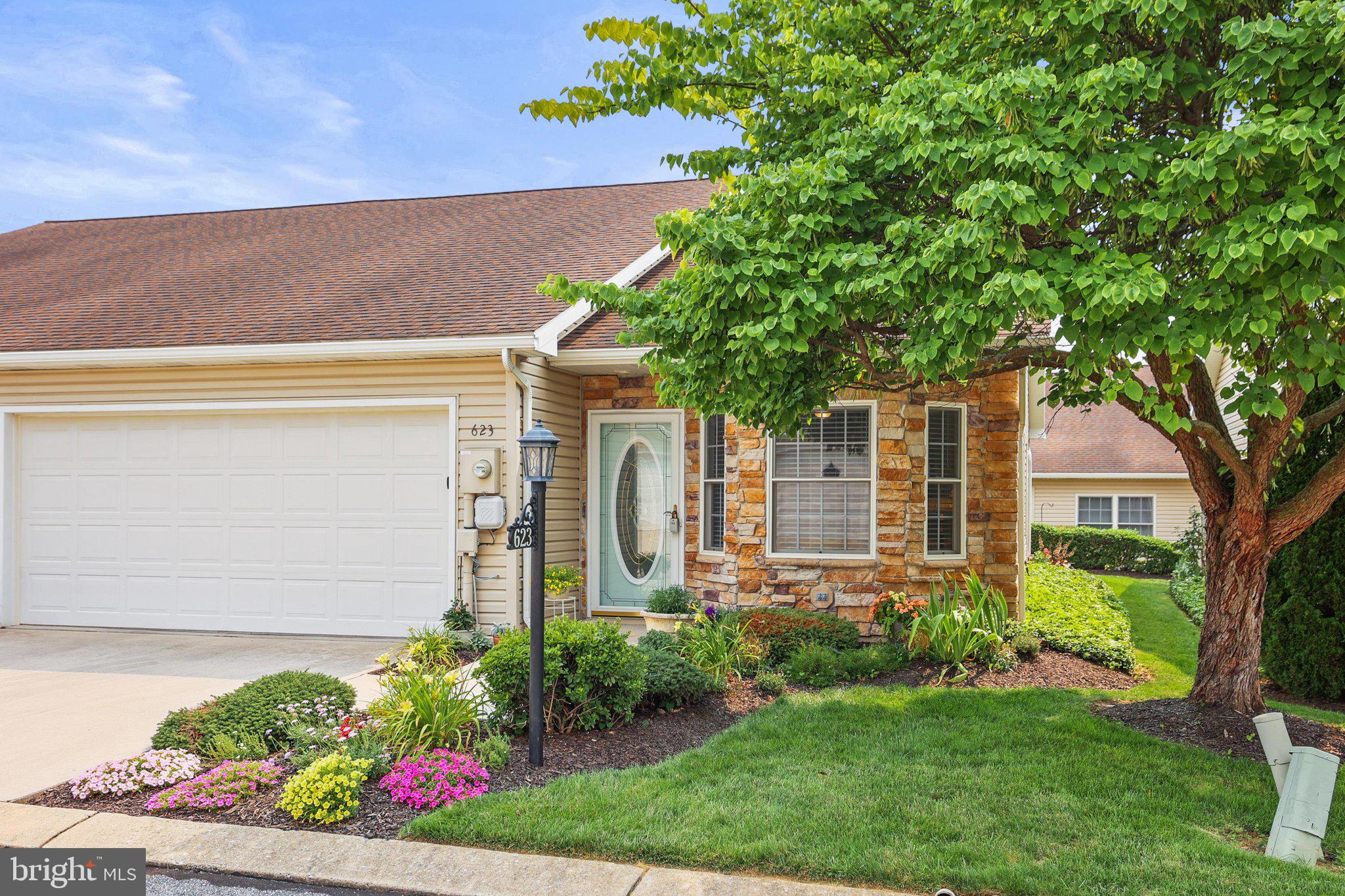 Enjoy low-maintenance living in this well-maintained 2-bedroom condominium in the desirable North Pointe community in Hanover. Conveniently located, this home offers generously sized rooms and a thoughtful floor plan designed for comfortable everyday living. The spacious living room features neutral carpet, crown molding and a ceiling fan, while the kitchen is beautifully appointed with granite countertops, a tile backsplash, breakfast bar, pantry, chair rail, and a tray ceiling in the dining area. Just off the kitchen, the screened porch provides the perfect spot to enjoy your morning coffee or unwind in the evening. Both bedrooms are generously sized. The primary suite features new carpeting, three closets with additional shelving, and a pocket door leads to the private bath with a shower and additional closet. Wide interior doorways enhance the home's open feel, and a pocket door conveniently separates the laundry area, complete with a utility sink, which lead to the attached two-car garage. The garage also includes a pegboard wall for organized storage, and the home offers a concrete driveway for additional parking. Additional updates include a new central air conditioning unit installed in 2023. This move-in ready home combines comfort, convenience, and easy living in one of Hanover's most desirable condominium communities.