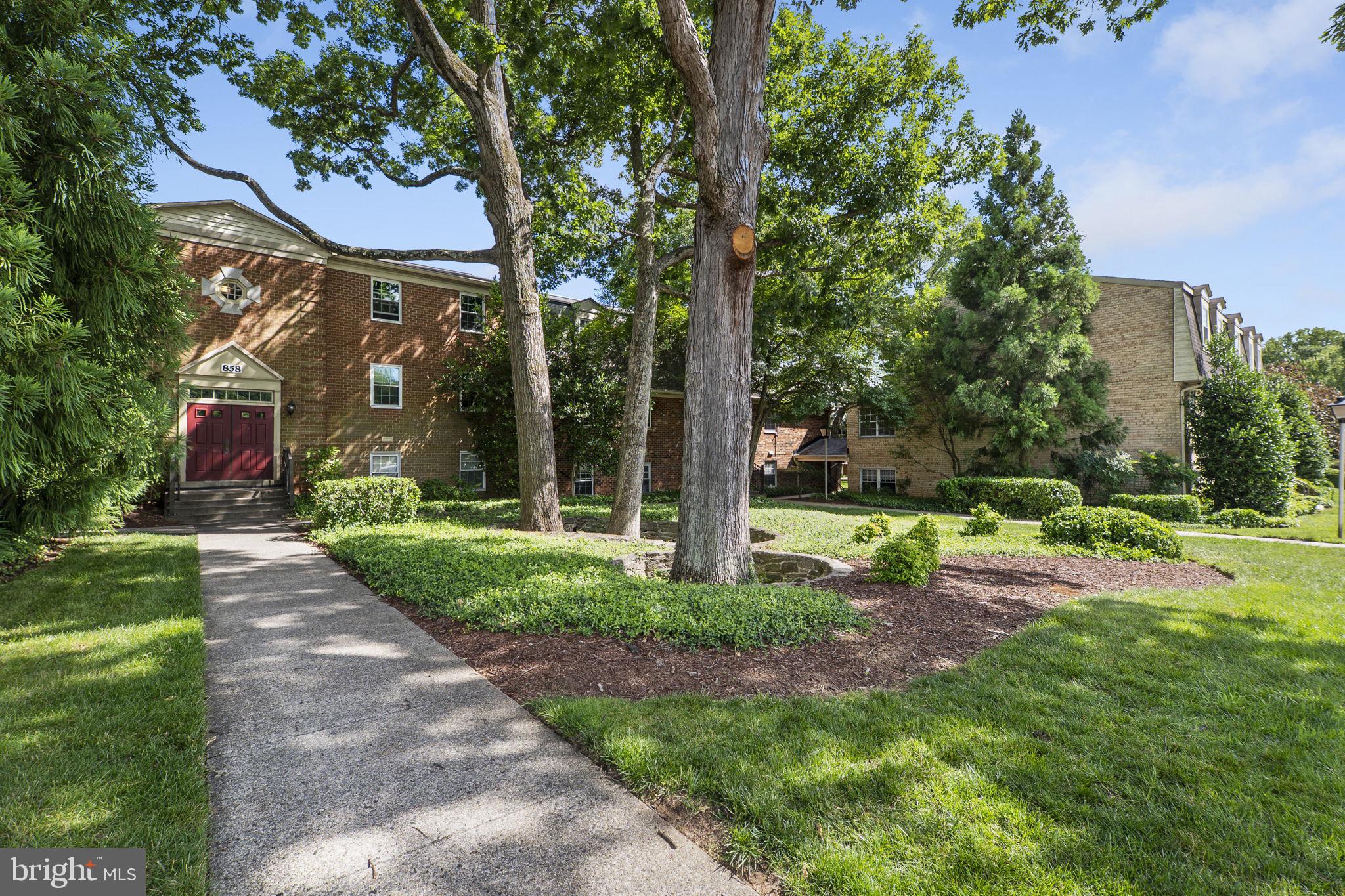 OPEN HOUSE SUNDAY,  June 21st from 2-4pm! Welcome to this light-filled and beautifully maintained top-floor condo in Rockville's highly sought-after Plymouth Woods community! This spacious home features 2 large bedrooms, 1.5 bathrooms, a versatile office/den, and generous living and dining areas, offering the perfect blend of comfort and functionality. The recently renovated kitchen boasts quartz countertops, stainless steel appliances, and modern finishes, while fresh paint, elegant crown molding, and a recently updated HVAC system make this home truly move-in ready. The spacious primary bedroom includes a walk-in closet and private half bath. Step outside to the large balcony and enjoy peaceful views of mature trees, landscaped grounds, and the community's pristine swimming pool. Residents enjoy exceptional community amenities, including a pool, picnic and grilling areas, playground, beautifully maintained grounds, and ample free parking. Ideally located within walking distance of College Gardens Park, College Gardens Elementary School, and Montgomery College, this home is also part of the top-rated Richard Montgomery High School cluster. Conveniently situated just minutes from Rockville Town Center, Metro, I-270, Route 355, Woodley Gardens Park, and the shops and restaurants of downtown Rockville. The low condo fee offers outstanding value, covering water, sewer, trash, gas for heating and cooking, outdoor pool, landscaping, free parking, and free laundry facilities in the building. The unit also includes a large assigned storage unit, and the condominium permits installation of an in-unit washer and dryer for added convenience. Don't miss this exceptional opportunity to own a move-in-ready home in one of Rockville's most desirable communities!