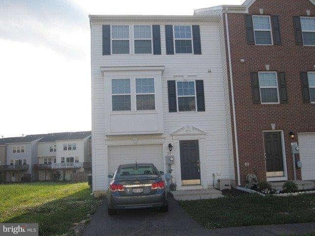 End Unit TH in Popular Manor Park. Ready for you today! Morning Room extension off kitchen. New lighting, pantry, island, new appliances, ceiling fans, fresh paint throughout, new hardwood floors, finished basement with half bath, laminate flooring and garage has auto opener and storage shelves. Master suite with bumpout, walk in closet and luxury bath with seperate soaking tub. Call today!