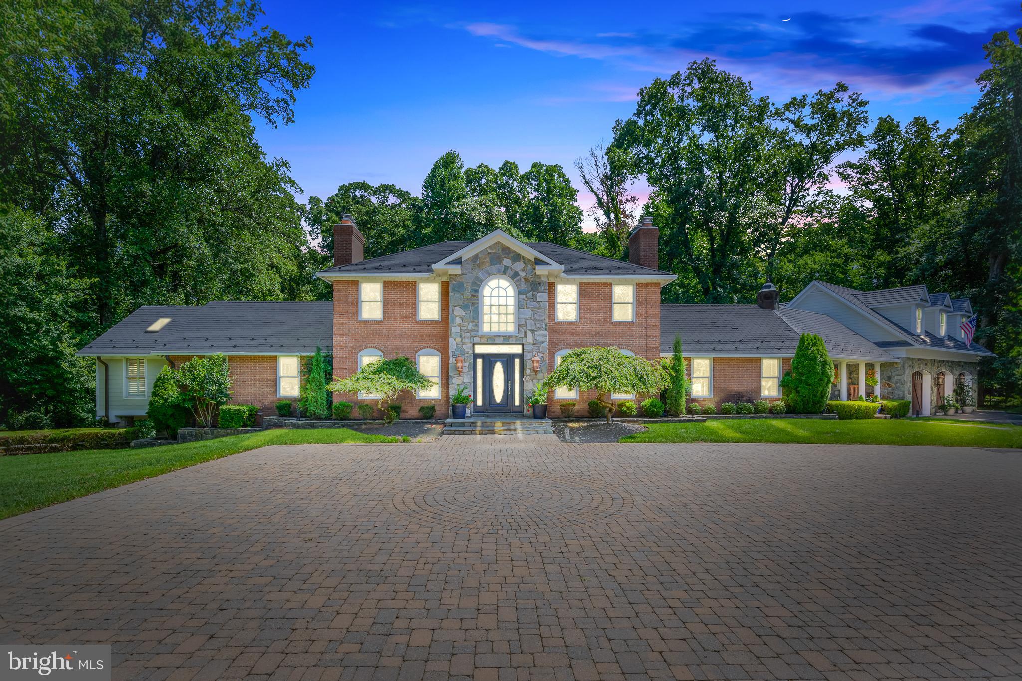 A remarkable find in picture perfect Great Falls!

Welcome to 337 River Bend Rd.  A distinguished custom-built estate offering 7 bedrooms and 5.5 bathrooms with a flexible floor plan, on 1.84 acres.

Ideally located near the Village of Great Falls, River Bend Park and minutes to Great Falls Park, this property is so close to the river that you can step into the private backyard oasis and listen to the sounds of river rapids after a good rain.

The recently remodeled gourmet kitchen is equipped with honed marble countertops, exquisite cabinetry and professional-grade appliances.  It is open to a four season breakfast room, the perfect spot to enjoy postcard-perfect views.

A catering kitchen off the family room is the ideal hub from which to cater for a crowd and it also serves as drop zone between the garage and the main house.  

The recently remodeled primary suite sits on the main level and has access to a back deck.  It was professionally designed to truly be a retreat that flows seamlessly from the light filled parlor to the tranquil bedroom and sitting room area  complete with gas fireplace, to the spa like bathroom with steam shower, jetted tub and heated floors and finally the walk-in closet with custom shelving. 

Additional features of this home include 5 more bedrooms as well as a spacious studio apartment, an oversized 3 bay garage, stunning custom wood bar on lower level, large home gym, stone patio with a large stone fireplace, and so much more. 

This address feeds to Great Falls E/S, Cooper M/S & Langley H/S.