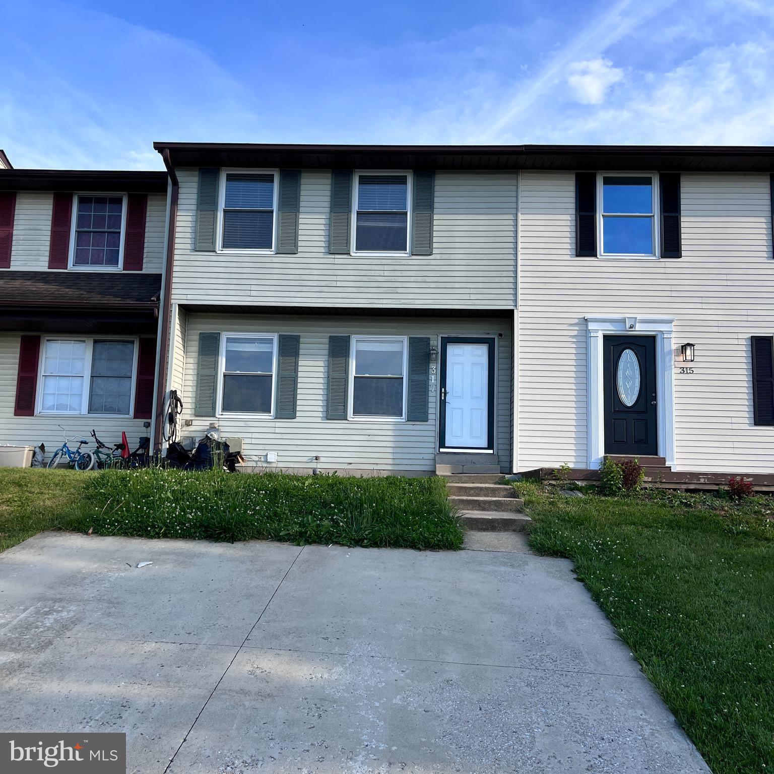 Welcome to one of the most affordable, updated Townhouses in Westminster. Featuring New Carpet and paint. New Kitchen flooring and counters. Updated Cabinets and appliances. The large living room has hard wood floors and custom niches for fun decorating. There are three bedrooms and two full baths on the upper level, including a nice primary, with attached bath.  The lower level is mostly finished and has a large laundry room with plenty of storage, and durable ceramic tile flooring. This could be a perfect playroom or family room. The Front yard has a small patio or sitting area. The rear yard has a deck with new railings. Make this your first home today.