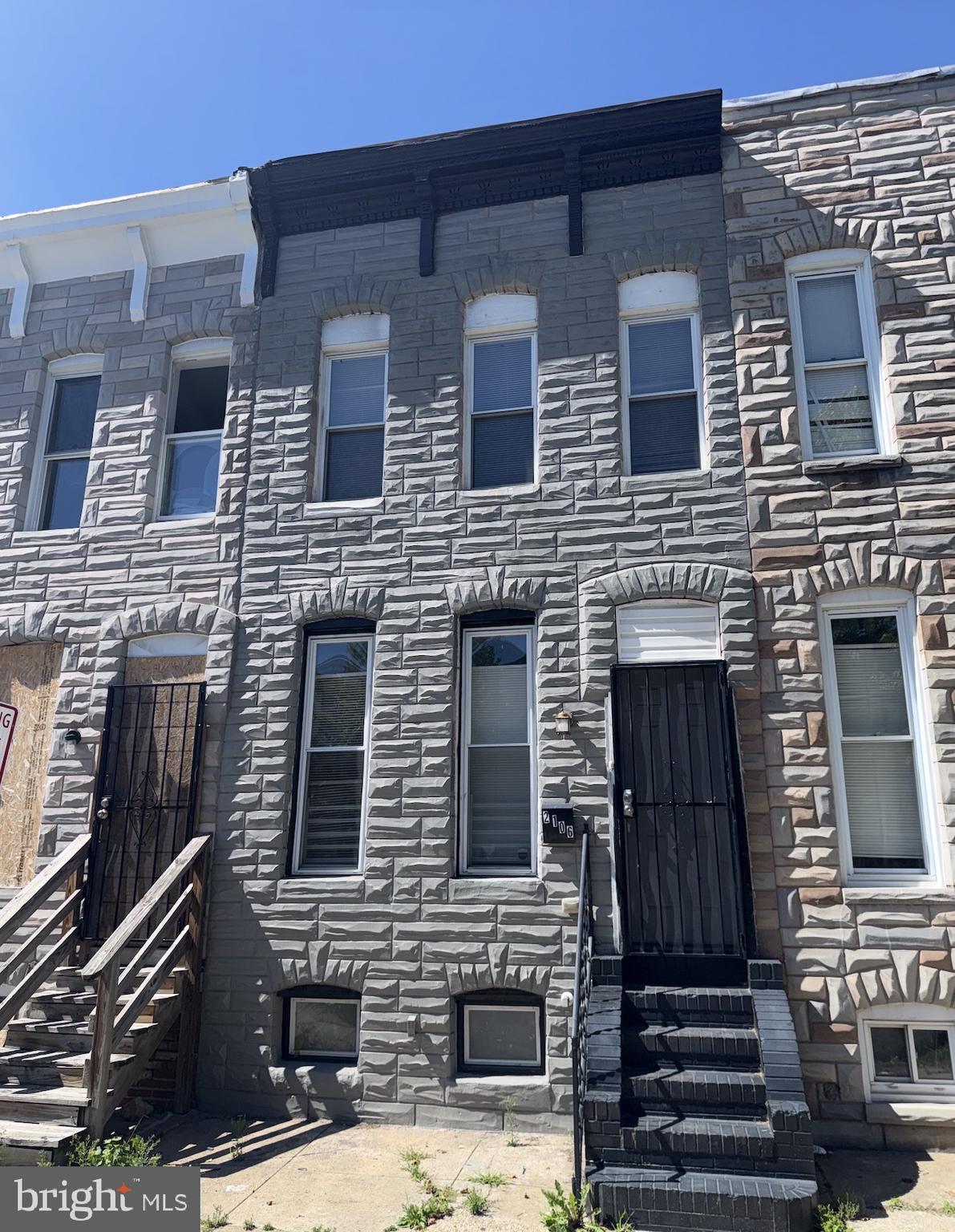 This move-in ready three-story row-home at 2106 Ramsay Street in Baltimore’s Carrollton Ridge neighborhood is an outstanding opportunity at just $99,000! Perfectly set up for immediate occupancy, the home features fresh carpet throughout all living areas, providing comfort and a clean, neutral base for your personal style. The main level offers a main level bedroom, dining room and kitchen, while the upper floors include two generously sized bedrooms and a full bathroom. Downstairs, the unfinished basement housing the washer/dryer room. Outside, you’ll enjoy a nice fenced backyard — perfect for relaxing, entertaining, or gardening. Ideal for first-time homebuyers, investors, or anyone looking for an affordable move-in ready property with room to grow. The home is conveniently located near Saint Agnes Hospital, major highways, public transit, parks, and shopping. Don’t miss this great opportunity — schedule your showing today!