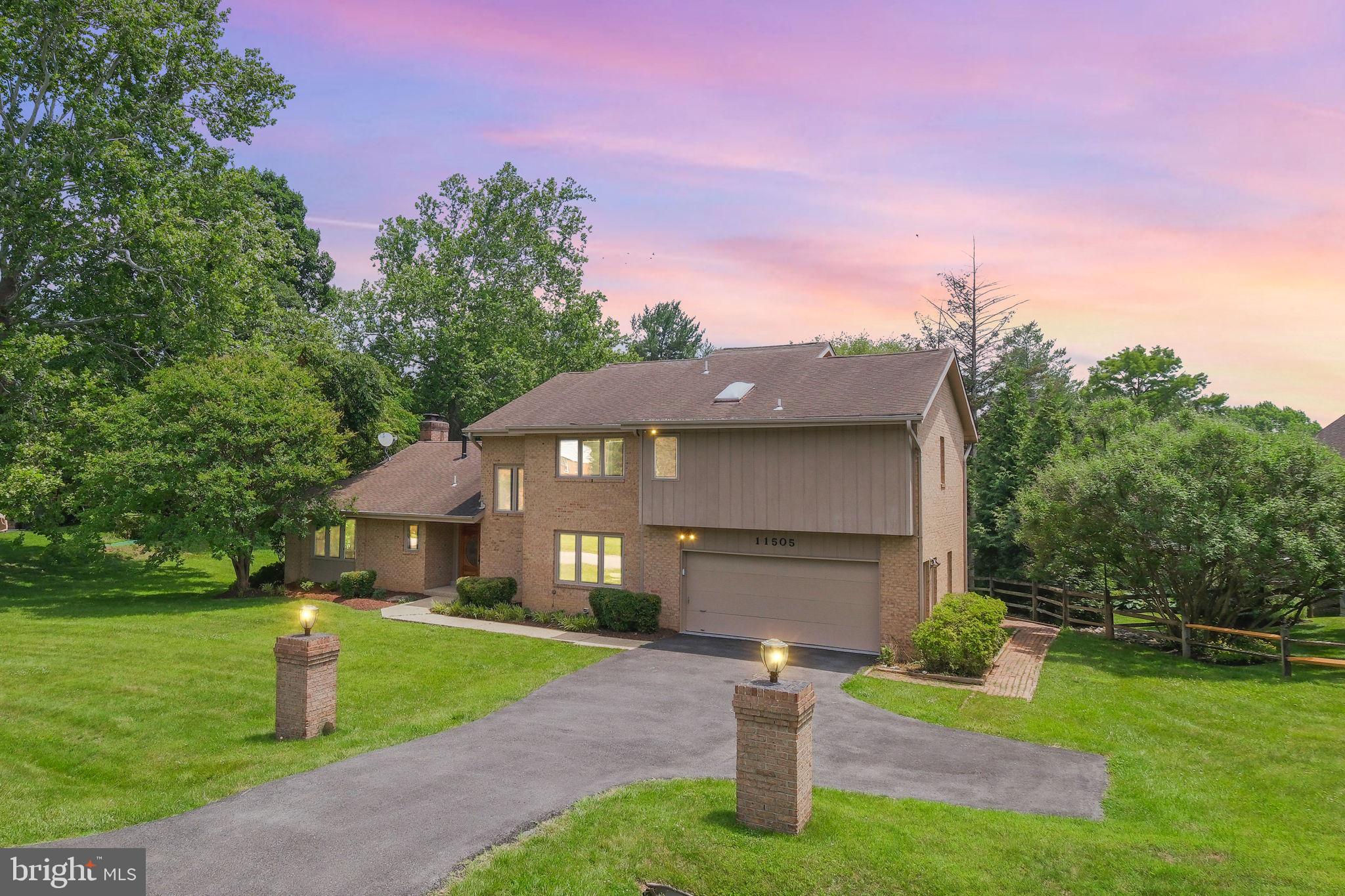 A Masterpiece of Mid-Century Modern Design in the Heart of Potomac.
Welcome home to this extraordinary custom residence one of the iconic Jack Greenspan homes that defines Potomac's most coveted architectural legacy. From the moment you arrive, the oversized driveway, beautifully landscaped grounds, and timeless design signal something truly special.
Inside, soaring 20-foot ceilings and walls of windows flood the home with natural light, creating a sense of grandeur that is both dramatic and deeply livable.  Custom site-finished hardwood floors flow throughout, complemented by fresh paint and new flooring that make this home completely move-in ready.
The state-of-the-art custom kitchen is a chef's dream thoughtfully designed premium appliances, a double wall oven, and a generous center island that anchors the heart of the home. Elegant formal living and dining rooms, a cozy fireplace, and skylights overhead set the stage for effortless entertaining, while a main-level office easily convertible to a bedroom adds rare flexibility.
Step outside to an expansive deck overlooking breathtaking, lushly landscaped grounds. Whether hosting summer gatherings or enjoying a quiet morning, the outdoor space is nothing short of spectacular.
Upstairs, three spacious bedrooms plus a gracious sitting room offer a private retreat from the world. The exceptional owner's suite features a beautifully renovated spa bath a sanctuary worthy of the home it anchors.
The walk-out lower level is where the magic continues. A second fireplace, a generous bedroom open directly to the stunning grounds, seamlessly blending indoor and outdoor living in the most sophisticated way.
A two-car garage, an oversized driveway, and an unbeatable location just minutes to Potomac Village  complete this rare offering.
Homes of this caliber, character, and craftsmanship simply do not come to market often. This is your moment.
