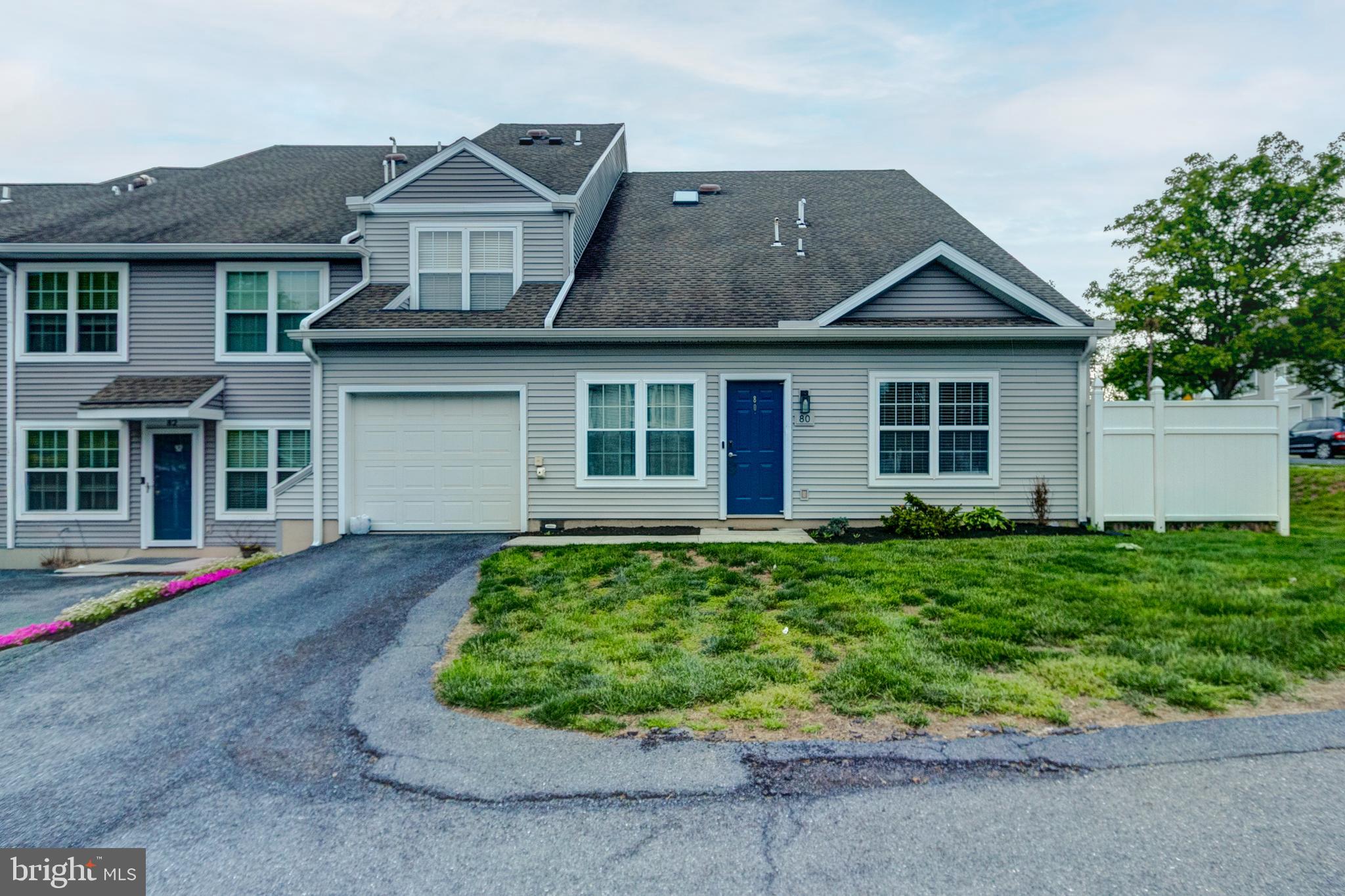 Welcome to this spacious end-unit condo offering both comfort and potential. This 3-bedroom, 2.5-bath home features a generous 1,800 sq ft floor plan designed for easy living.

The main level includes a bright living area with a vaulted ceiling, a dedicated dining space, and an updated kitchen—perfect for everyday living and entertaining. You’ll also find a large first-floor primary suite, providing convenience and privacy.

Upstairs, there are two generously sized bedrooms, a full bath, and a versatile bonus area ideal for a home office, reading nook, or relaxation space. An additional attic room offers extra storage along with utility access.

Recent exterior updates include new siding, giving the condo a fresh, modern look.

With its size, layout, and desirable end-unit location, this home is full of opportunity to make it your own.
SIDE NOTE
The seller will have the rest of the flooring in the one bedroom and closet completed before closing.