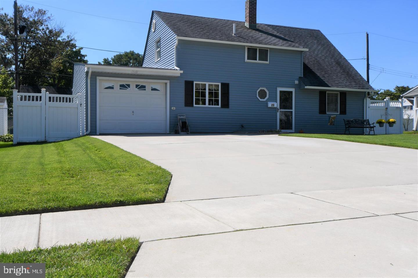 This Amazing 2-story Traditional home is ready for its new Owners. This home has great curb appeal, luxurious front and back manicured lawns, a double wide concrete driveway, concrete walkways, and vinyl privacy fencing. As you enter you immediately feel right at home. The foyer area has a full bathroom as you enter and then it openly flows into the Living Room, which has large triple windows allowing an abundance of natural sunlight to give this home a warm and cozy feeling. The Eat-in kitchen features light wood cabinetry, a new stove, and tiled floors. The first floor living room and bedrooms has brand new carpet that runs all the way up the stairs. The 2nd downstairs bedroom has new laminate flooring, and is perfect for an office, playroom, nursery, or craft room. The upstairs features two large bedrooms and a large storage area. The storage area can easily be converted into a second bathroom if desired. Your garage has inside access from the kitchen. The garage has plenty of room for your car and storage. Exit your garage to the backyard, which has a large concrete patio for Barbecuing & Entertaining. This home comes with a very large shed and plenty of room for outdoor activities. This home has Central Air and a heat pump with oil heat backup. The oil tank was removed and replaced with a top-of-the-line covered Roth above-ground oil tank. A brand new sewer line was installed on 6/2023.  The 200-Amp electric is equipped with a transfer switch for a generator hook-up. This beautiful home is located within minutes from shopping, dining, and easy access to Philadelphia, New Jersey, and New York. Make this home first on your to-see list because it has it all!