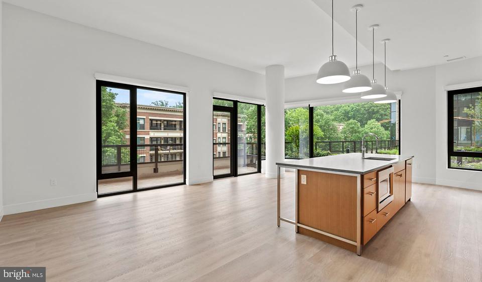 Look-and-Lease Incentive until January 5th 2025. We can honor the current $500 credit to encourage quicker decision-making for moving fees. All T-unit levels will come with a Martha Stewart induction cookware set upon move-in.


2 Months FREE Rent, conditions apply.

Nestled in the heart of Bethesda, Maryland, Ravel and Royale offer an unparalleled living experience that seamlessly blends luxury, nature, and culture. This duo of naturally inspired apartment communities is situated in the vibrant Strathmore Square, providing residents with a truly balanced lifestyle.

Ravel, an intimate boutique community of 49 homes, features sophisticated 2+ bedroom residences with spacious layouts and expansive balconies and terraces that invite the outside in. Royale, on the other hand, offers a diverse range of living spaces from studios to 3-bedroom apartments, catering to various lifestyle needs.

Both properties boast European finishes, generous terraces, and light-filled rooms that create an atmosphere of elegance and comfort. The thoughtfully designed interiors are complemented by an array of exceptional amenities, including a restorative dry sauna, a 24/7 fitness center, and a roof lounge offering sweeping views of the picturesque Rock Creek Park.

Residents of Ravel and Royale enjoy a lifestyle that harmoniously combines urban convenience with natural serenity. The unrivaled location, right at the Grosvenor-Strathmore Metro Station, ensures easy access to the wider Washington D.C. area while being tucked away in a tranquil neighborhood. The proximity to Rock Creek Park provides ample opportunities for outdoor recreation and relaxation, perfect for nature enthusiasts.

The Strathmore Square neighborhood is a haven for art and culture lovers. Through a unique partnership with the acclaimed Strathmore Music Center, residents receive exclusive access to diverse programming, including bi-annual sessions with a Curator Concierge, culturally-rich performances, and early offerings for premier seats. The community also hosts free evening concerts featuring Strathmore Artist in Residence alumni as part of the Music on the Square series, adding to the vibrant cultural atmosphere.

Living at Ravel and Royale means embracing a lifestyle where style, connectivity, and serenity converge. Whether you're unwinding in the restorative dry sauna, enjoying the panoramic views from the roof lounge, or exploring the nearby cultural attractions, every day offers new opportunities for enrichment and relaxation.

The surrounding neighborhood of Bethesda is known for its upscale dining, shopping, and entertainment options, further enhancing the living experience. With the perfect balance of urban amenities and natural beauty, Ravel and Royale provide an idyllic home for those seeking a sophisticated, arts-inspired living environment in one of Maryland's most desirable locations.

** Pricing and availability subject to change on a daily basis ** Photos are of model units ** Parking may be available for an additional fee **