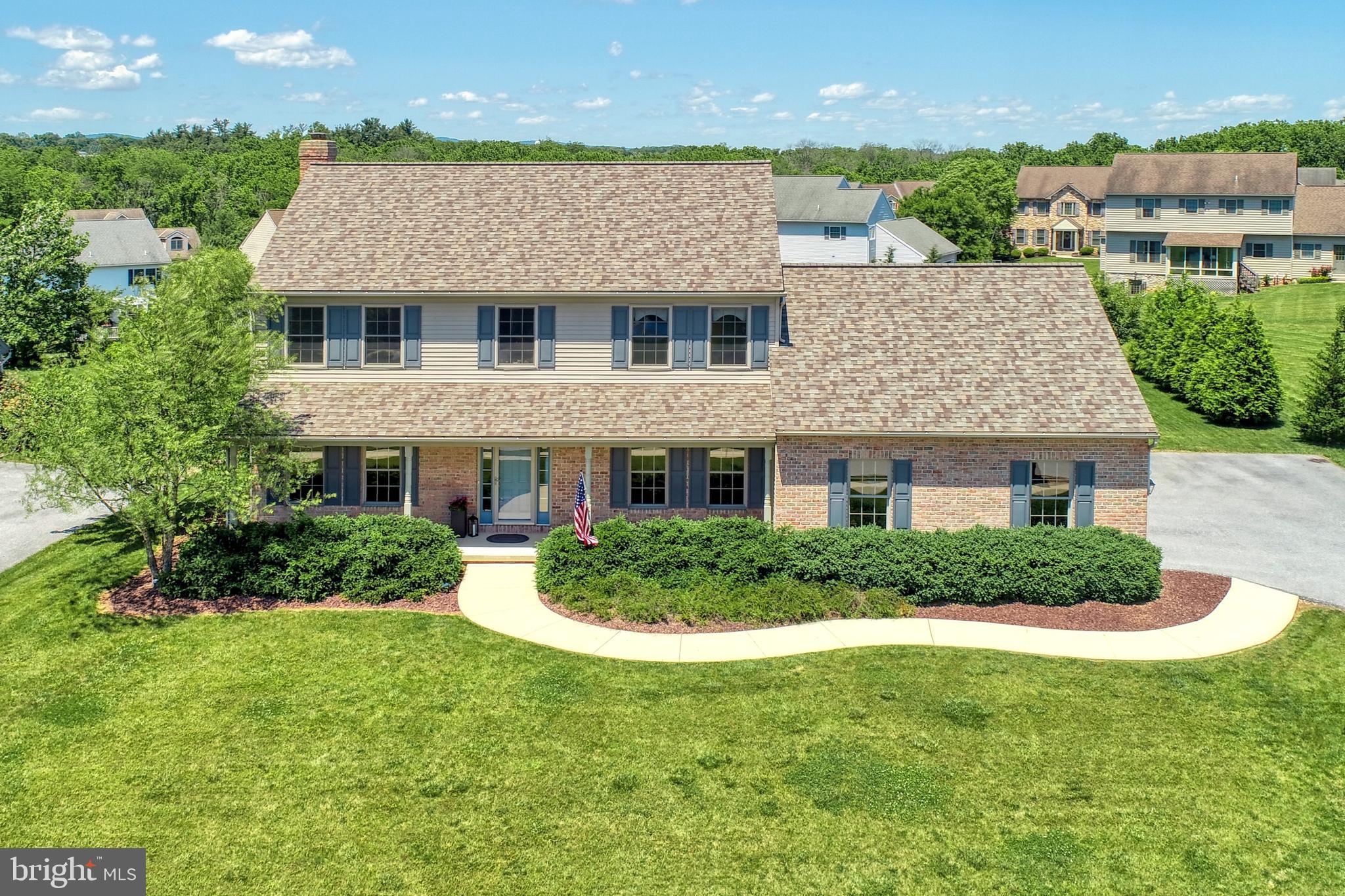 Enjoy the summer of 2019 in your new home sitting around the inground heated diving pool.  You will be the envy of all of your friends. Other exterior features are 2 covered porches, paver patio, and beautiful landscaping.  Enter the front door of this 4BR, 2.5BA home and fall in love with the hardwood flooring, cherry kitchen with granite countertops, island, gas fireplace, 9' ceilings, 1st floor laundry and mud rooms which lead to the 2 car oversized garage.  This property has a rural feel but is close to many amenities.  You will be delighted.