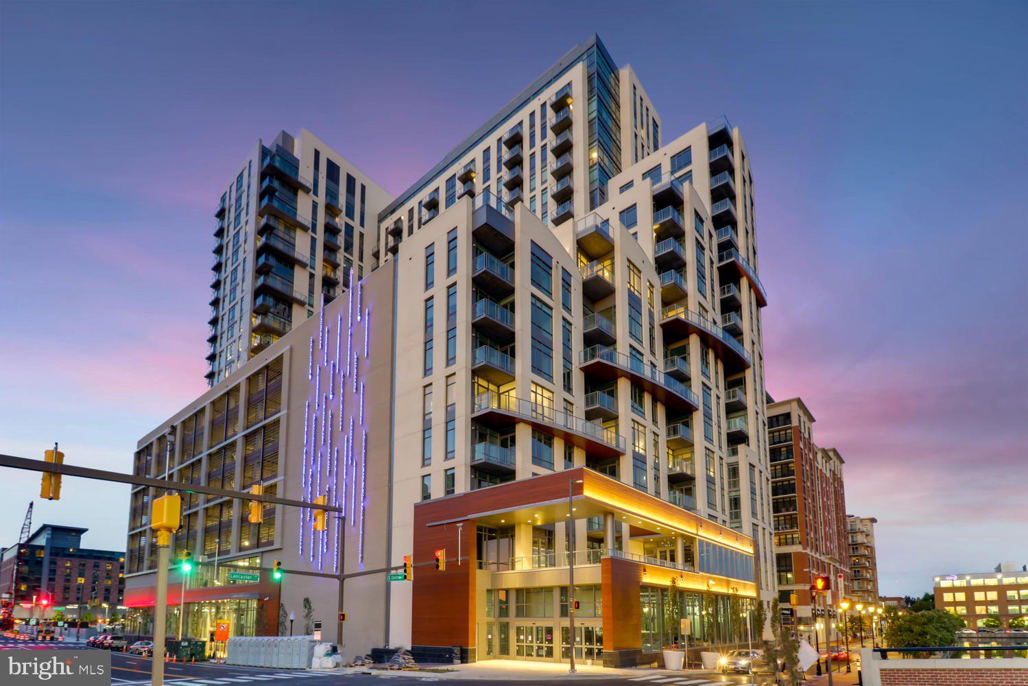 This spectacular corner three bedroom two and one half bath residence with over 2,900 square feet occupies a full-floor of this newly built condominium in Harbor East. Enter the residence through a private elevator vestibule with its own valet closet for discrete delivery. The sun flooded great room provides captivating river views and Baltimore’s Harbor through the floor-to-ceiling windows. The state-of-the-art open kitchen is a chefs dream, masterfully designed and meticulously appointed with Italkraft custom cabinetry and premium appliances by Thermador including a gas range with vented wall hood, and MicroDrawer microwave. The stunning oversized marble waterfall island flows seamlessly into the entertaining space. The primary bedroom suite was thoughtfully designed with a walk-in closet and illuminated spa bathroom outfitted with Kallista & Kohler fixtures, Carrara marble floors and walls, expansive walk-in shower and custom designed marble dual vanity. Two additional bedrooms and full bath. 2 garage parking spaces convey. New construction 5 year tax phase-in applies. Liberty Harbor East is Baltimores newest luxury waterfront address. The boutique condominium offering 33 residences with stunning waterfront architecture, designer finishes, and an enviable Harbor East location atop a brand new flagship Whole Foods Market create the opportunity for the ultimate downtown lifestyle. Liberty is located in the heart of Harbor East surrounded by best-in-class dining, shopping and conveniences of downtown living. Residents will enjoy a private Concierge level with social lounge, automated and secured package room and ButterflyMX intercom security system. Residents will also enjoy access to over 30,000 square feet of private, state-of-the-art indoor and outdoor amenity spaces including a clubroom with indoor/outdoor bar, rooftop infinity pool deck with cabanas, courtyard seating, grilling stations, communal and private dining rooms with catering kitchen, fitness center, yoga studio, Pet park with dog agility and training equipment, conference rooms, study lounge with computer stations and fireplace.