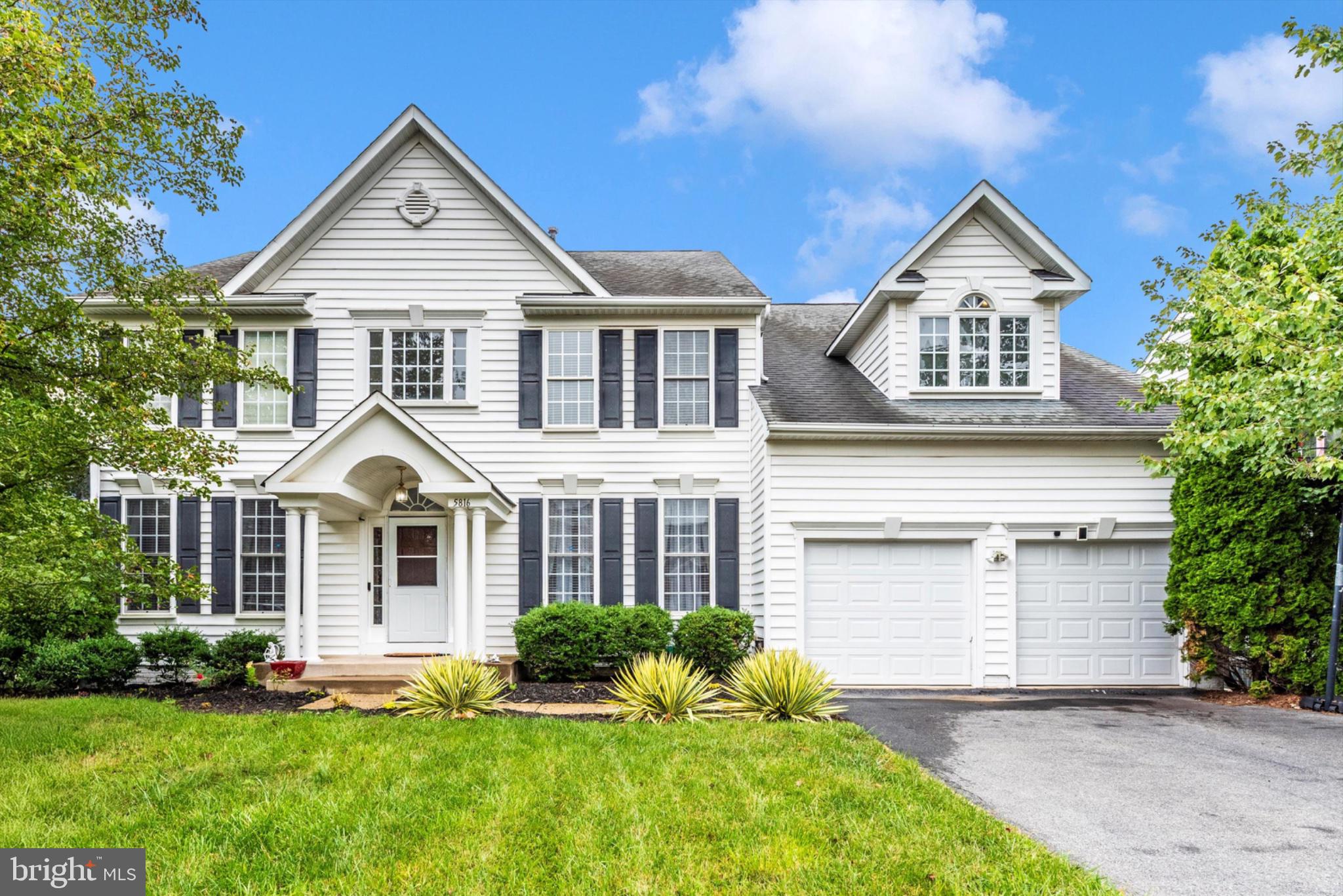 Welcome to this spacious home in the desirable Greenview community of New Market! This classic residence offers an unparalleled combination of space, style, and is one of the largest models in the community-with an expansive quiet back yard facing a wooded reserve.
The main level is designed for both grand entertaining and comfortable daily living, featuring beautiful hardwood floors and elegant tray ceilings. The heart of the home is the dramatic two-story family room, complete with a stunning stacked stone fireplace. Prepare meals in the large, gourmet kitchen, which boasts an abundance of cabinetry, granite countertops, a kitchen island, and stainless steel appliances. This level also includes a formal dining room, a versatile den perfect for a home office, and a convenient half bath.
The upper level features four spacious bedrooms, including an expansive primary suite that serves as a private retreat. The suite is complete with a separate sitting room and a luxury bath package.
The entertainment possibilities continue in the fully finished, walkout lower level. This impressive space is complete with a wet bar, a theater area, a fifth bedroom, and a full bathroom, making it ideal for guests or an in-law suite. From here, a sliding glass door leads out to a beautiful stone patio.
The Greenview community provides a wonderful lifestyle with convenient access to the shopping, dining, and parks of New Market and Frederick, as well as major commuter routes. Don't miss your chance to own this exceptional home that combines luxury and a great location!   This home is ready for you to make it your own - come and see the possibilities.