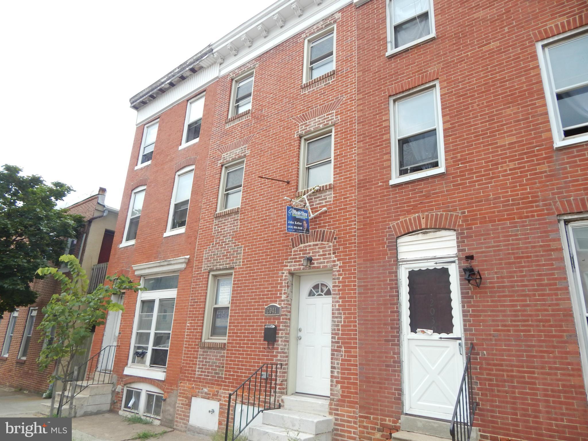 This is a beautifully renovated home just a block from Hopkins. Everything is BRAND NEW.  Granite counter tops, S/S applnces.  Hrdwoood floors.  Central air.  2nd fl laundry rm.  Privacy fence w/ Offstreet parking pad in rear. Hopkins LNYW grant. Eligible for $10k City V2V grant.  $1,000 down gets you into this house & 5 yr. tax credit.  Walk to Patterson Park, restaurants & shops.  Great Price!