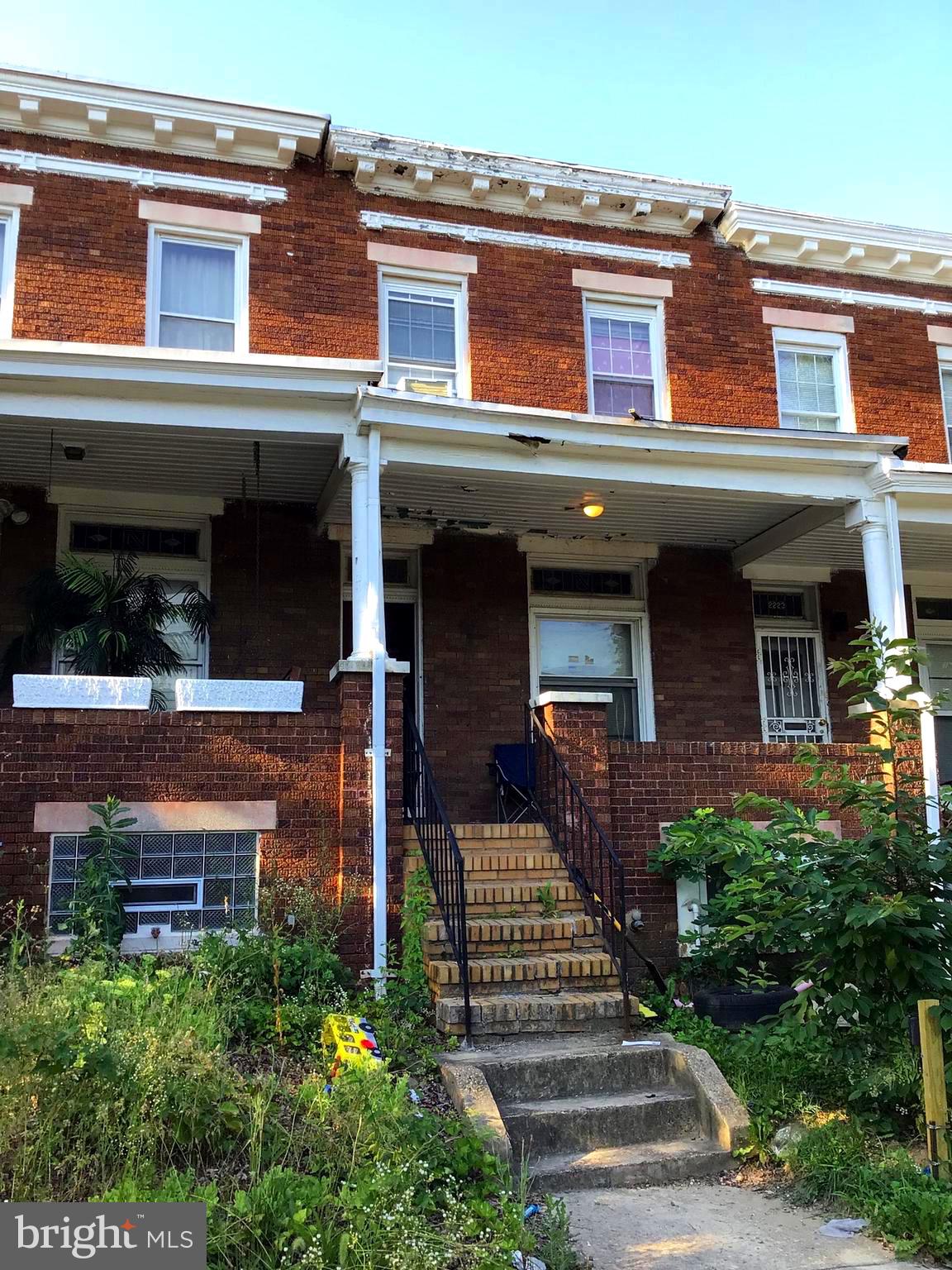 Welcome to 2221 W. Lexington Street, a charming 2-bedroom, 1.5-bath brick rowhome on a tree-lined street in West Baltimore. This inviting home features hardwood floors, a solid wood staircase, and a spacious den between the bedrooms—perfect for a home office, family room, or flex space.

Relax on the welcoming front porch or explore the potential of the large unfinished basement, offering ample storage and endless possibilities for customization.

Conveniently located on the MTA CityLink Blue bus route and just minutes from the West Baltimore MARC Station, this home provides easy access to downtown Baltimore, shopping, dining, entertainment, hospitals, schools, and major commuter routes.

Whether you're a first-time homebuyer or an investor, this home offers comfort, convenience, and opportunity in a well-connected location.