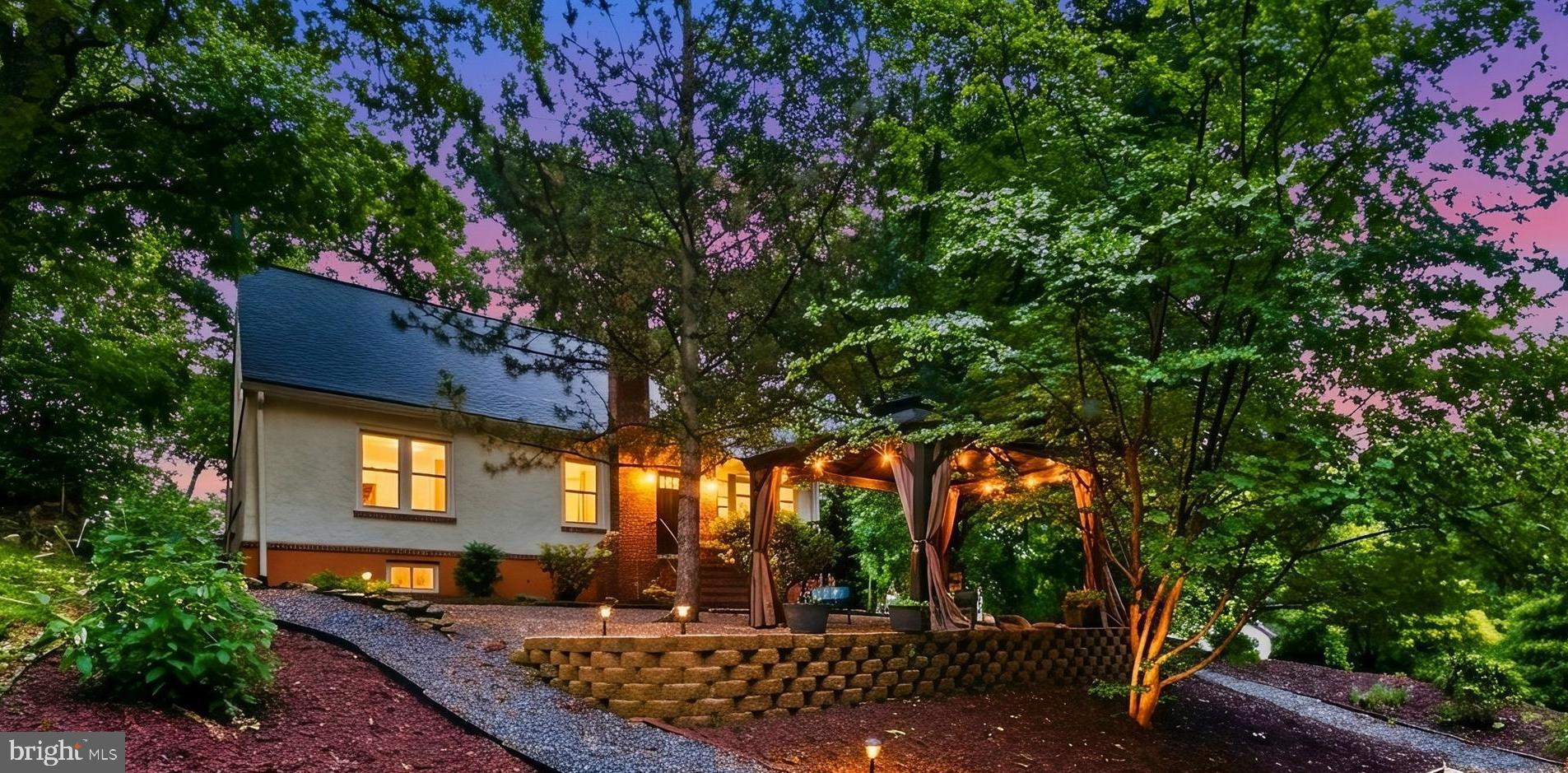 Tucked behind mature greenery, this Halethorpe home makes a quietly memorable first impression with its wide driveway, attached two-car garage, shaded approach, and terraced outdoor setting that hints at more than what is first revealed from the street. Inside, the home unfolds with character-filled spaces, including upper-level rooms with angled ceilings, warm wood finishes, and flexible layouts that invite imagination. The basement adds another layer of possibility, offering valuable usable space that could be shaped around storage, hobbies, media, work-from-home needs, or whatever vision the next owner has in mind.
Located in Halethorpe, MD 21227, this home offers convenient access to the Baltimore metro area while keeping local parks, shopping, dining, commuter routes, and recreation within reach. The area is known for its proximity to I-95, I-695, MARC train service, UMBC, Patapsco Valley State Park, and the broader Baltimore-Washington corridor, making it a smart location for buyers looking for everyday convenience with regional connectivity.
This is the kind of property that rewards a closer look. From the attached garage and wooded surroundings to the flexible interior spaces and basement potential, there is plenty here for buyers to discover in person. Schedule your private showing today and see why this home may be the opportunity you have been waiting for.