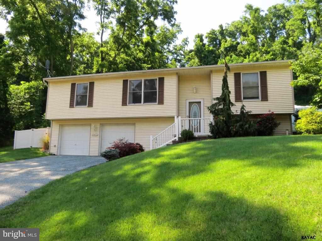Immaculate Move-In Condition. 3BR 2FB home on 1/2ac lot. Foyer w/ceramic tile fl. Kit w/all newer appls, ceramic tile fl overlooks LR & DR w/wood fl. Patio doors to beautiful, unique & fenced 50x12 patio. Great home for entertaining. LL FR & LDR w/ceramic tile fl. Many upgrades thruout home. OS 2car garage & off st. Great location for restaurants, and shopping.