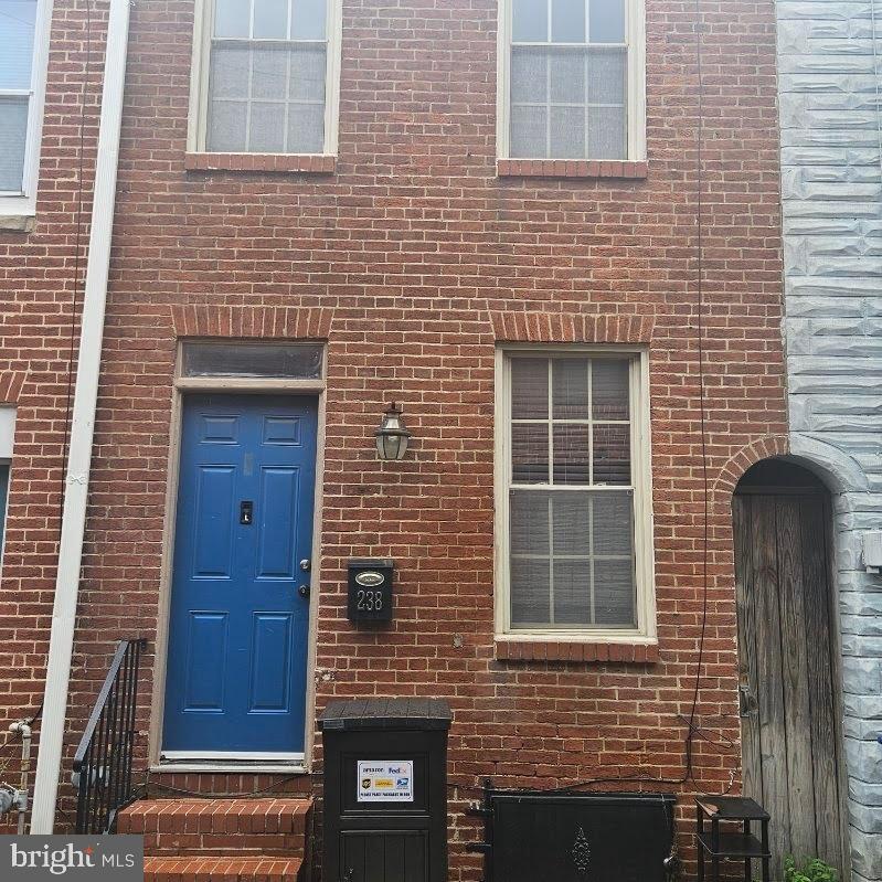 Charming 2-bedroom, 2-bath home located on the historic street where Billie Holiday spent part of her childhood, celebrated today with vibrant neighborhood murals honoring her legacy. The primary bedroom features a cozy gas fireplace, creating a warm and inviting retreat. Recent updates include a water heater replaced in 2022 and an HVAC system backed by a 10-year warranty for added peace of mind. Ideally situated just minutes from Fells Point, with easy access to dining, shopping, waterfront attractions, and city conveniences.