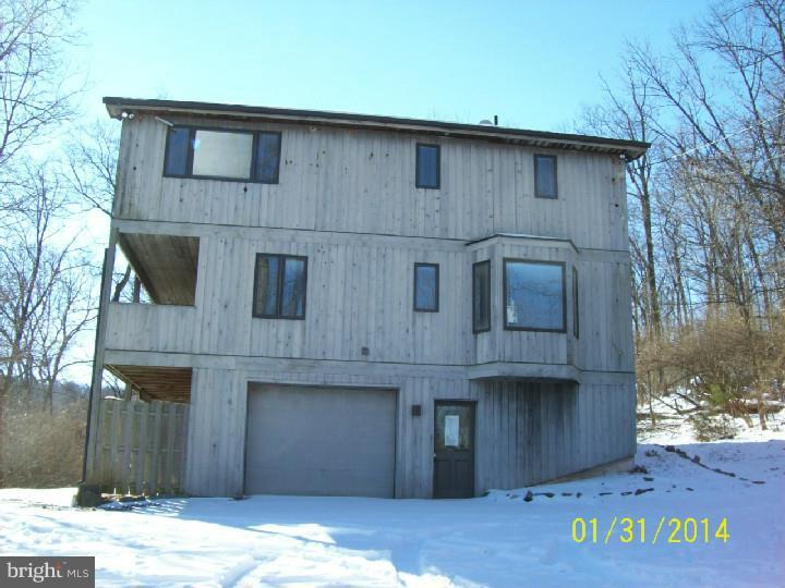Corporate Owned/REO. Freddie Mac First Look Owner Occupied only or non profits only until (Feb. 19, 2014). Property being sold as-is. Some repairs have been made to driveway and septic system. Contact listing agent for details. Purchaser responsible for any municipal inspections or transfer requirements. Purchaser pay both sides of transfer tax. Purchaser responsible for all final utility reads. 3 bedrooms, 2 bath mountaintop home on 5.53 acres in Wilson Schools. Peace and quiet and surrounded by nature yet close to everything. Great opportunity for a rehab loan.
