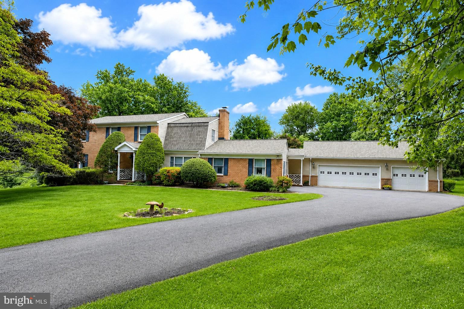 Welcome Home! Nestled on 2.20 picturesque acres, this beautiful home offers space, comfort, and versatility both inside and out. The main level is designed for everyday living and effortless entertaining, featuring a welcoming entertaining room off the side entrance, a spacious laundry room with folding table, full and half bathrooms, an elegant sitting room with a cozy fireplace, and a sun-filled sunroom with skylights overlooking the serene backyard. The spacious kitchen offers room for a large dining table and flows seamlessly into the formal dining room and expansive living room, Sunroom provides access to the rear deck for easy indoor-outdoor living and entertaining.

Upstairs, you’ll find 4 generously sized bedrooms, including a primary suite complete with an en-suite bathroom and walk-in closet. The finished walkout basement provides endless possibilities with multiple flex spaces ideal for a gym, home offices, recreation or entertaining areas, along with a cedar closet and an additional full bathroom.  3 Car Garage and Large Driveway provide lots of parking! A rare combination of privacy, functionality, and charm in a beautiful setting.