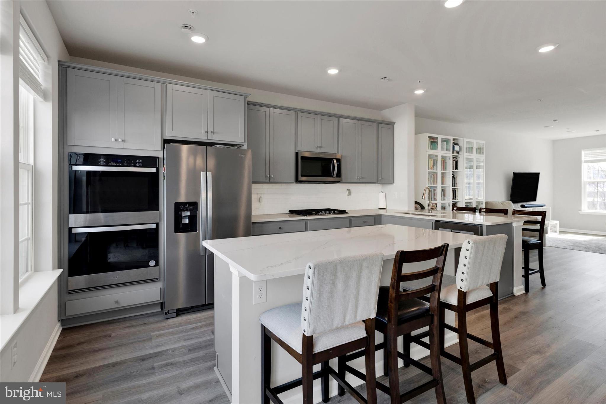 Welcome to this stunning Steelpointe Townhome located just blocks from the heart of downtown Phoenixville! Built only two years ago, this home offers the perfect blend of modern style and everyday convenience—without the wait for new construction.
Inside, you’ll find 3 bedrooms, 2.5 baths, and a versatile lower-level recreation room ideal for a home office, workout space, or playroom. The gourmet kitchen features stylish grey cabinetry, white quartz countertops, a large island with ample seating, walk-in pantry, double oven, and stainless steel appliances.
The open concept dining and living areas are bright and spacious, leading to a large deck perfect for outdoor dining or entertaining. Upstairs, the Owner’s Suite includes a walk-in closet and private bath, while the second-floor laundry room offers added convenience with built-in cabinetry.
Additional highlights include a 2-car rear-entry garage and driveway parking. Enjoy a walkable lifestyle to Phoenixville’s renowned restaurants, shops, farmers markets, and community events, plus nearby trails, Valley Forge National Historical Park, and Phoenixville Country Club.      A Matterport 3D video is available to view at the top of this listing.    “Special Fiancing Incentives available on this property from SIRVA Mortgage.”