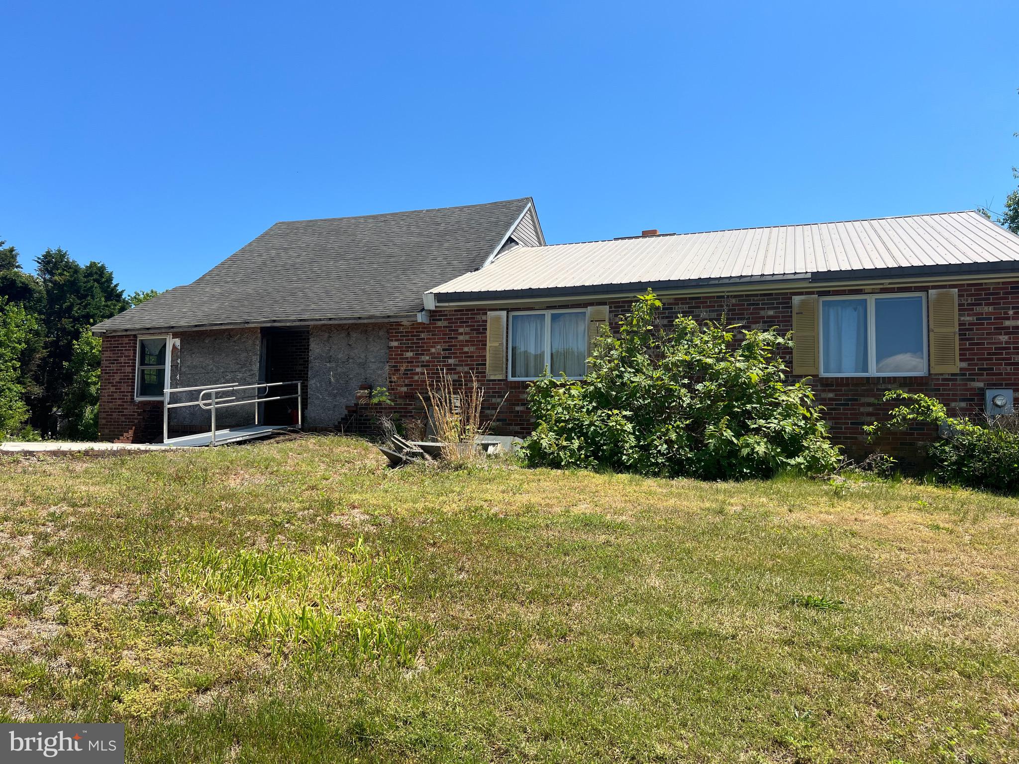 Discover the freedom and possibilities of country living at 16052 Pickering Dr in Milton, Delaware. Set on a generous 1 acre agricultural/residential parcel, this property offers privacy, space, and flexibility with no HOA and minimal building restrictions.

The existing 3‑bedroom, 1,680 sq ft brick bungalow—built in 1920—provides a solid foundation for a full renovation or redevelopment. Featuring a two‑level layout, fireplace, and classic charm, the home is ready for a visionary buyer to restore or reimagine.

With ample room for outbuildings, gardens, or hobby farming, this homesite is perfect for contractors, outdoor enthusiasts, or anyone seeking a peaceful retreat just minutes from Lewes and Rehoboth Beach.