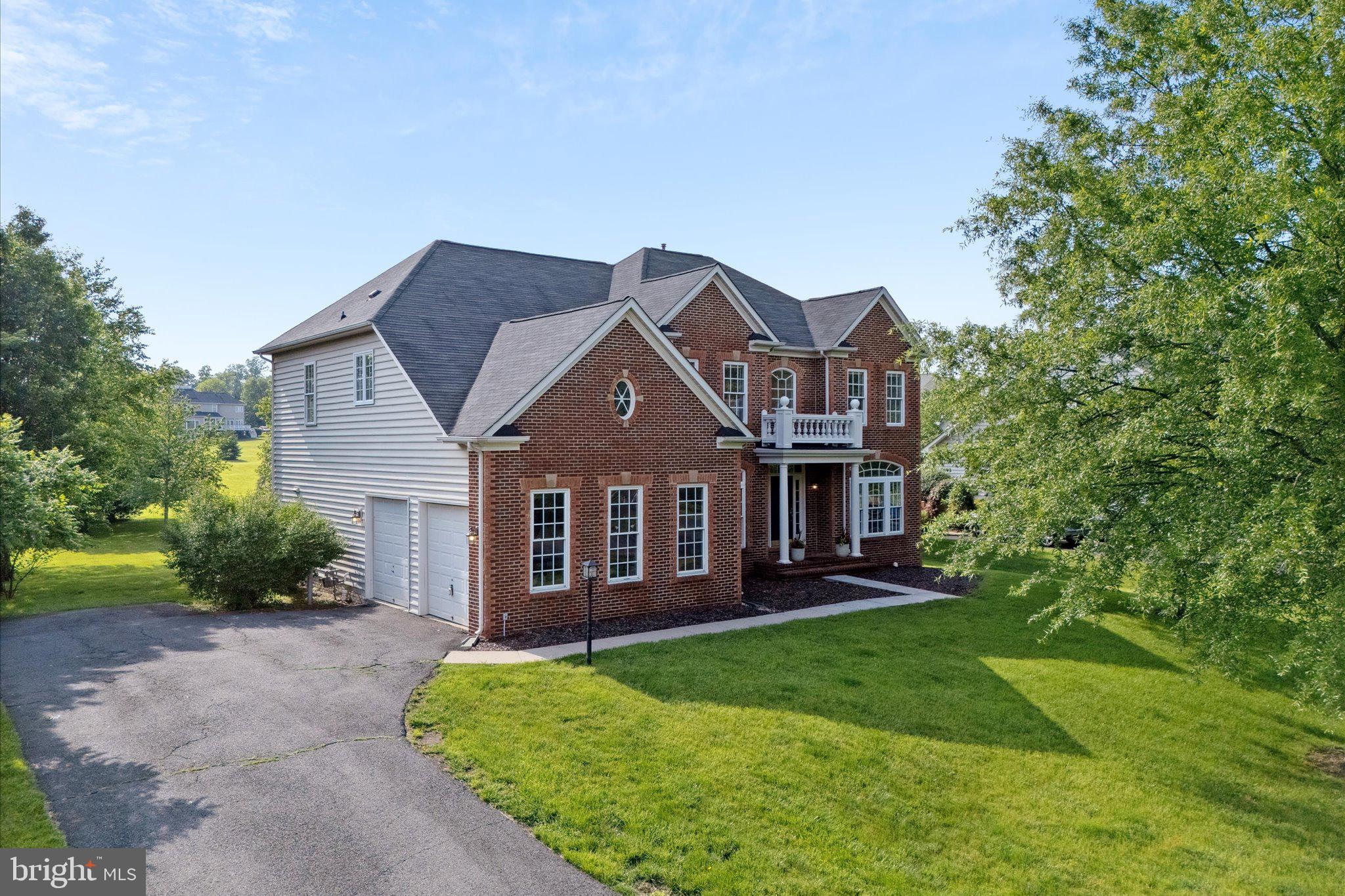 *Accepting formal back up offers*

Welcome Home to 22405 Belle Terra Drive in Ashburn! 

Lovely east-facing brick front home with side-load two-car garage in the sought after community of The Park at Belle Terra.  Situated on a flat half-acre lot backing to common area for additional privacy and greenspace.  A large dining and living room flank the foyer, leading to a two story great room with gas fireplace overlooking the spacious backyard accessed via french doors to a large deck providing easy access to your backyard activities.  Adjacent to the great room is a large kitchen perfect for entertaining with tons of cabinetry that even extends to a butler’s station between the kitchen and dining room. Off of the garage is the large laundry/mudroom ready to customize to best suit your needs.

Hardwood floors extend from the main level up to the bedroom level with 4 bedrooms and 3 full baths.  The open hallway to the primary suite overlooks the great room. The generous-sized primary suite off the back of the home has a large walk-in closet with built-in storage and light-filled bath with walk-in shower and soaking tub.  Flanking the front of the home are two good-sized bedrooms connected via a jack and jill bath.  A fourth bedroom with it’s own attached bath is off the back of the home.

An additional 1400+ square feet of finished living space in the basement features an open living room, wet bar, full bath, tons of storage and french doors with a walk-up to the backyard.  Perfect for a media room, home gym, and additional guest space.  Zoned for Loudoun County Schools:  Waxpool Elementary, Eagle Ridge Middle and Briar Woods High School.  With easy commuting access to the toll road and metro and close to all the conveniences Ashburn offers, this home is not to be missed!