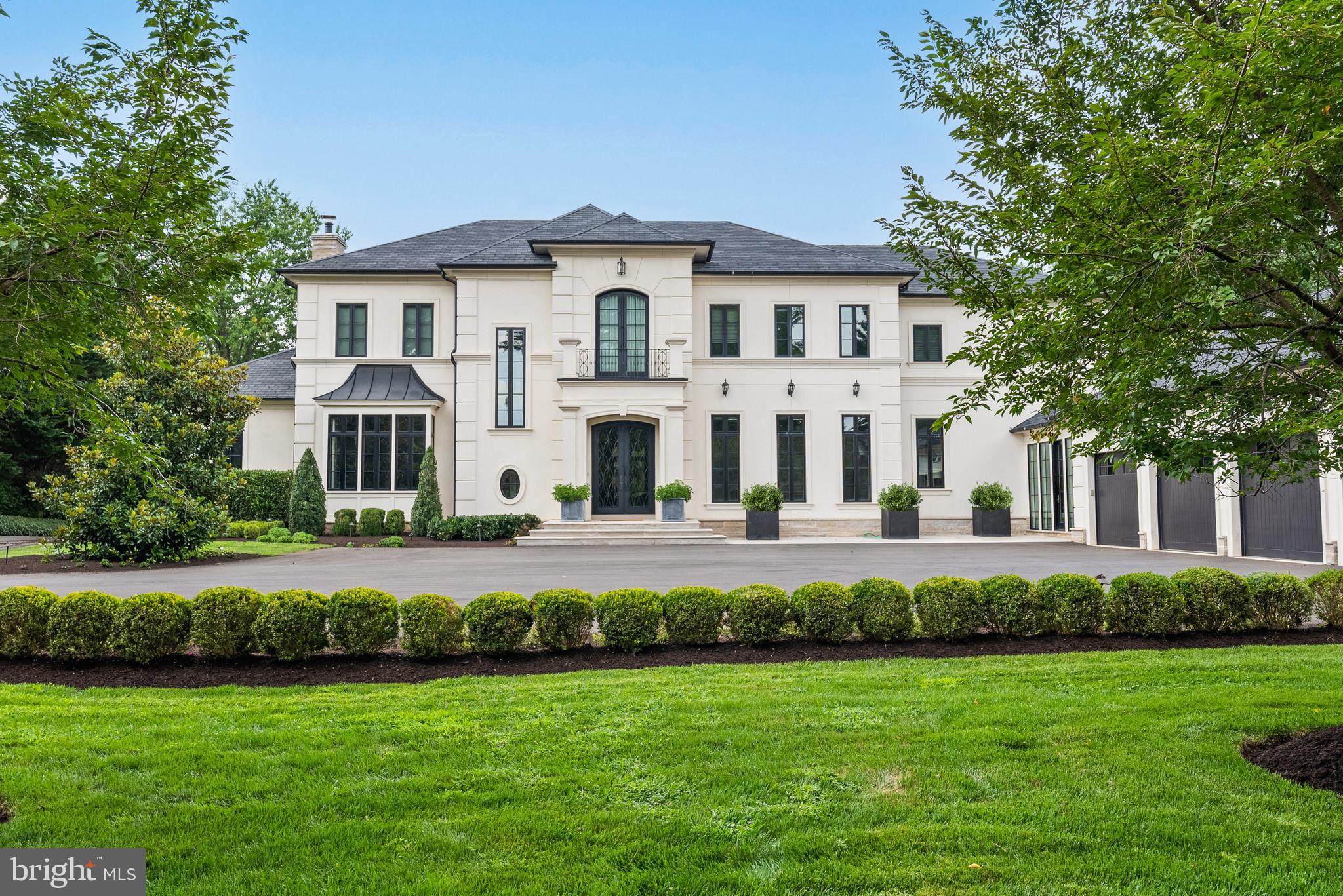 Sited on a tree-lined street in the Avenel Community of Bethesda, this exceptional renovated estate epitomizes modern luxury and refined elegance. Boasting 6 bedrooms, 9.5 bathrooms, and approximately 14,900 SF of exquisitely designed living space across 4 levels, serviced by an elevator for effortless convenience. The Main Level welcomes you through a grand vestibule and foyer, flanked by a formal Dining Room and Living Room. A two-sided gas fireplace divides the Living Room and an inviting Study, ideal for work or relaxation. A Gourmet Kitchen, complete with a Breakfast Room, that seamlessly flows into a spacious Family Room adorned with tray ceilings and a wet bar, and complete with a separate wine bar and pantry provides the perfect amenities for entertaining and everyday living. The Family Room opens to a covered terrace and rear patio featuring a swimming pool, hot tub, fire pit area, and tennis court, creating an unparalleled outdoor oasis. An attached 4-car garage with direct access to a Mudroom, a Playroom, 2 walk-in closets, a full Bathroom and a half Bathroom complete this level’s offerings. The Upper Level is anchored by a luxurious Primary Suite with two expansive walk-in closets, a spa-like bathroom, and access to a connecting balcony with a pergola. Four additional ensuite Bedrooms, each with walk-in closets and private bathrooms, provide comfort and privacy for family and guests alike. A Laundry Room and elevator add convenience to everyday living. The Lower Level offers an entertainer’s dream with a large Recreation Room featuring a wet bar, an Exercise Room, a 6th Bedroom Suite, an additional Bathroom, a Storage Room, Utility Space, and access to the elevator. Stairs from the Lower-Level lead to a dedicated indoor full-sized sports court, complemented by additional storage rooms, making it ideal for year-round activities and recreational pursuits. From its exquisite indoor spaces to its resort-like outdoor amenities, this Bethesda estate offers an unparalleled lifestyle in proximity to the area’s revered dining, retail, and entertainment. Zoned for Carderock Springs ES, Thomas W. Pyle MS, and Walt Whitman HS.