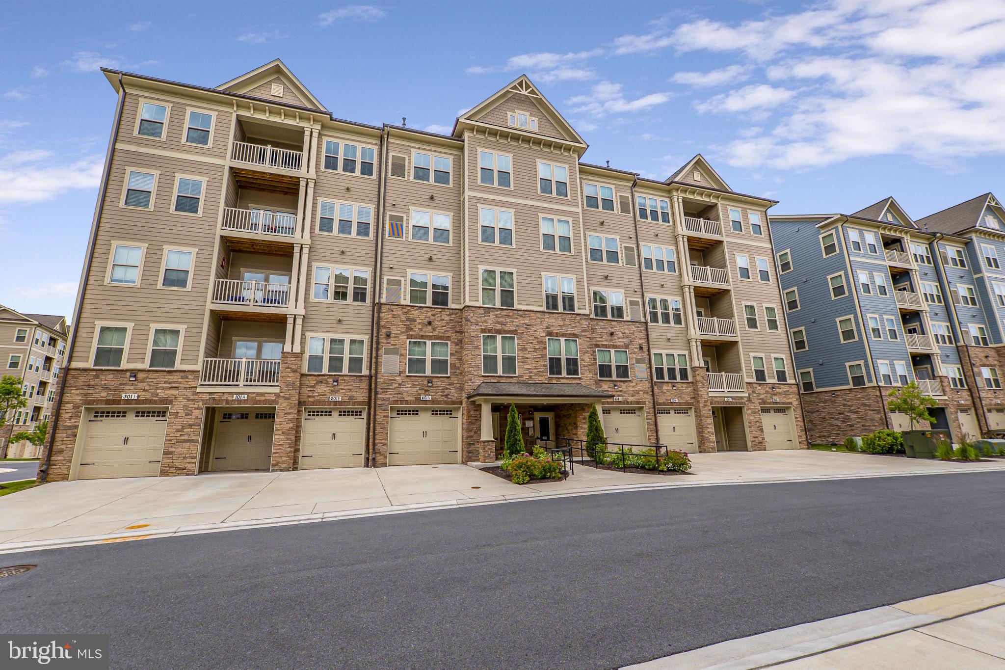 Built in 2023, this traditional-style apartment features an inviting open layout, ideal for both relaxation and entertaining. Enjoy upgraded countertops in the kitchen, complete with stainless steel appliances, a convenient island, and a cozy breakfast area. The spacious primary suite boasts a walk-in closet, standard closet and an ensuite bathroom for convenience. Additional highlights include a second story loft, recessed lighting, ceiling fans, and a combination dining/living area that enhances the home's warmth. The community amenities are truly exceptional, featuring a clubhouse, outdoor pool, fitness center, and pickleball courts, perfect for staying active and socializing with neighbors. Scenic walking paths and a dog park add to the outdoor charm, making it easy to enjoy the beautiful surroundings. Residents benefit from well-maintained common areas, lawn care, and essential services like snow removal and trash collection, all included in the association fee. The Woodlands is a 55+ community and conveniently located near local parks, and public services, ensuring a vibrant lifestyle. Experience the comfort of home in a community that values connection and well-being.