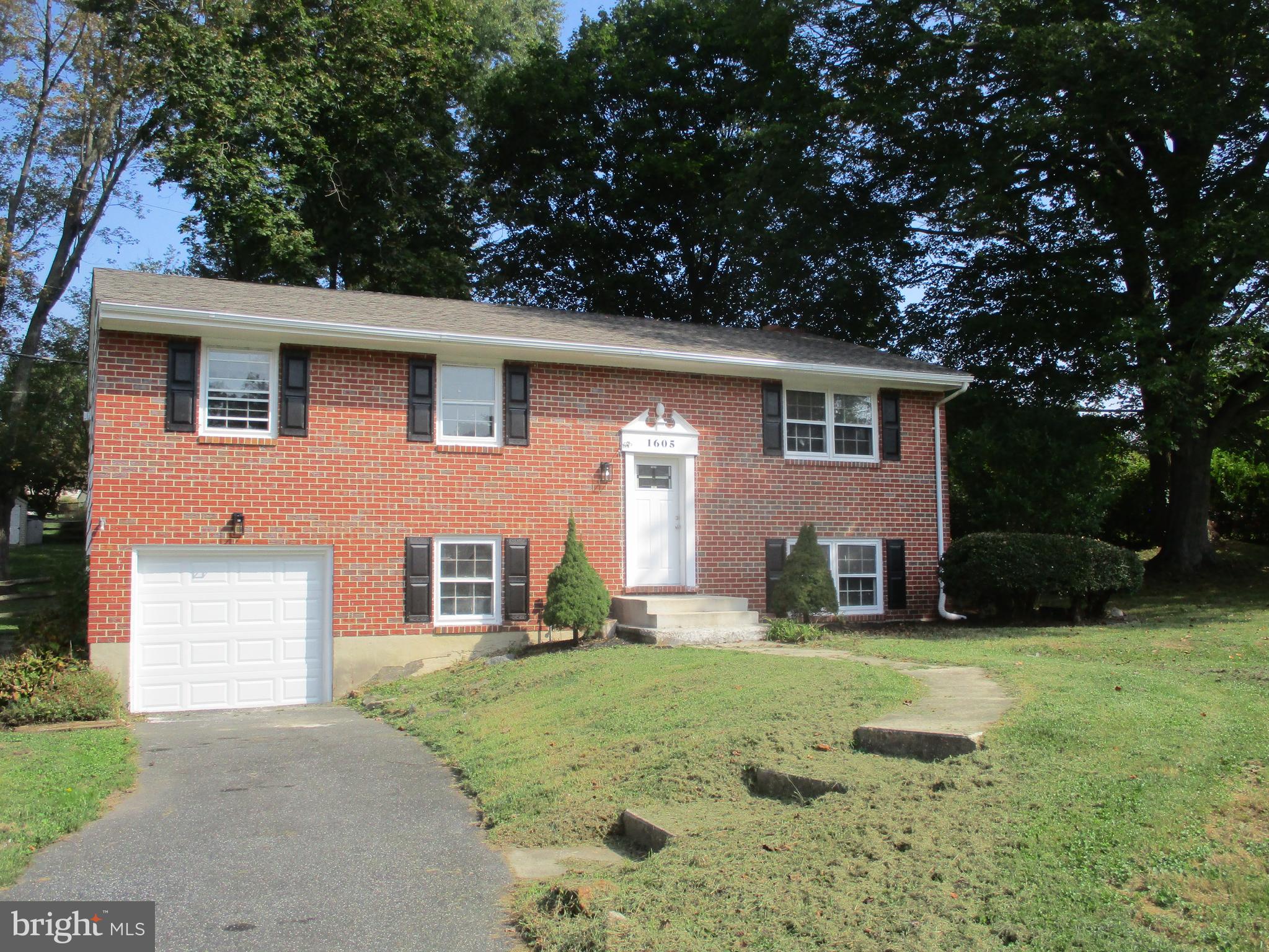 Price Reduced! Forest Hill brick front bi level three bedroom, two and a half bath located on a corner lot.Updated interior with new flooring, paint, new kitchen , half bath, and more! Amenities include finished lower level with fireplace, updated roof and HVAC, wood floors, and attached one car garage. Located close to shopping and Rt 1 for commuting. Bel Air is a short drive away.  Call now to tour!