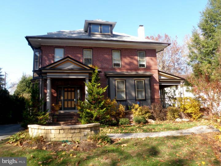 RUHE HEIM - PEACEFUL HOME - CLASSIC VICTORIAN BUILT CIRCA 1910. HISTORY, ARCHITECTURAL DETAIL, LOCATION BEST DESCRIBES THIS LANDMARK IN WYOMISSING. Enter this Victorian home through a beautiful wrap around porch with wrought iron railing and a custom designed Mosaic tile walkway. Proceed through a classic grand foyer with every attention to detail including horsehair plaster, dental molding and columns leading into a formal living room abounding in a dramatic atmosphere of original wall sconces, detailed box bean ceiling and a ornate wall framed mirror and fireplace. Additional columns lead you into the entrance of a spacious formal dining room offering an dramatic copper ceiling and a corner cupboard from the Historical Center Park Area. This home provides a comfortable kitchen combined with a butlers pantry/mud room with additional storage. Ascend to the level through a dramatic stairway - this level features 4 spacious bedrooms plus an office featuring a huge storage closet. The third level could easily be finished for 5th bedroom, playroom, etc. Arrive to the fun filled lower level by stepping down a solid wood stairway combined with a Historic banister post. Family room wired with speakers for movie theater. This level also features a full bath including Jacuzzi tub, a workshop, laundry room and additional storage. Step outside this impressive home and you will enjoy a deck off the kitchen with awning and a lovely terraced brick patio and a spacious 2.5 car garage. Additional features include hardwood floors, solid wood doors, custom window shades, newer heating and a/c system, new roof replaced on home and garage 2014. Central air installed in kitchen and 2nd level. Call today for a private tour of this Gracious Home!